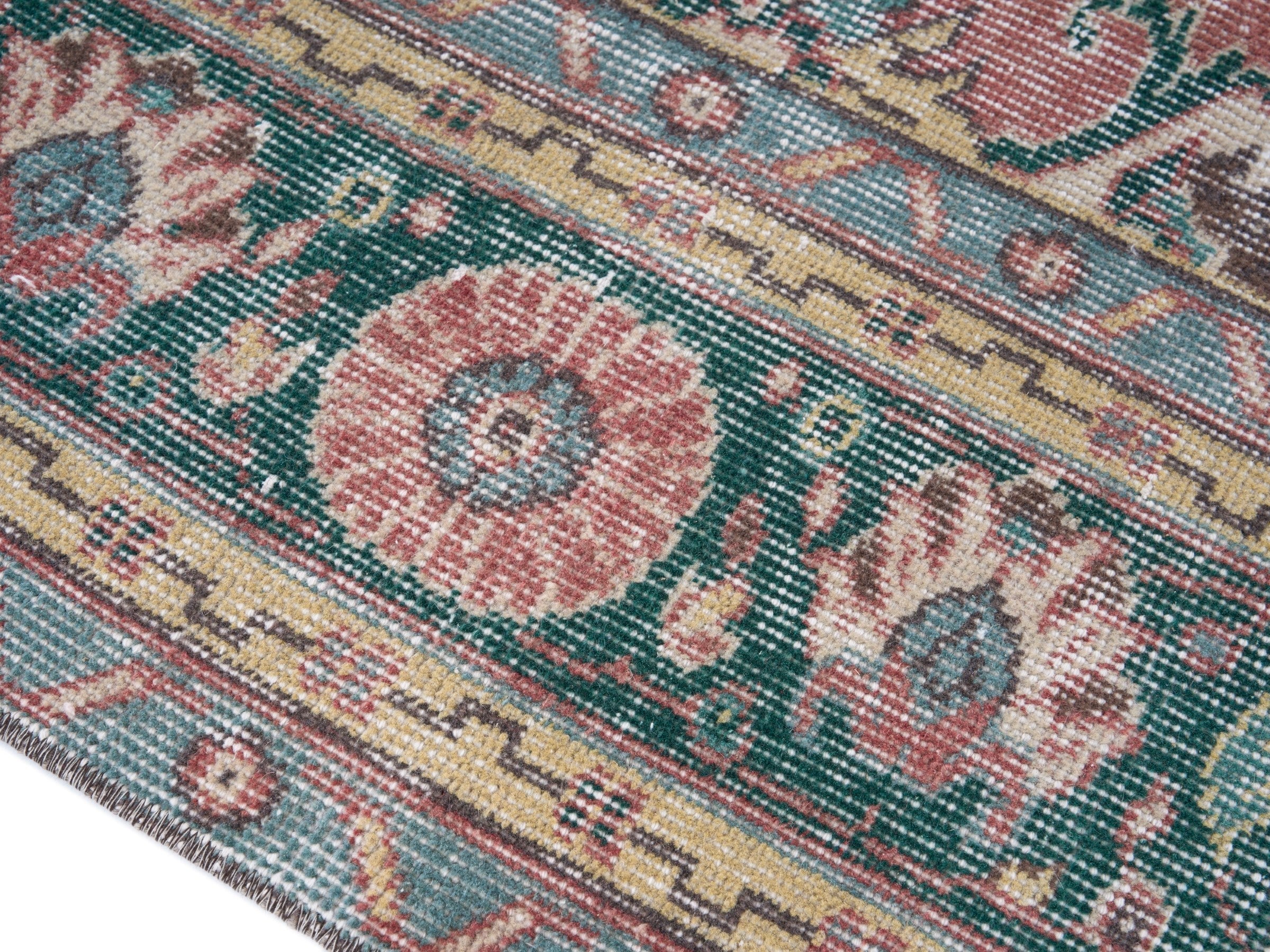 Turkish Isparta area rug in dusty rose and sage, view 6 of 10