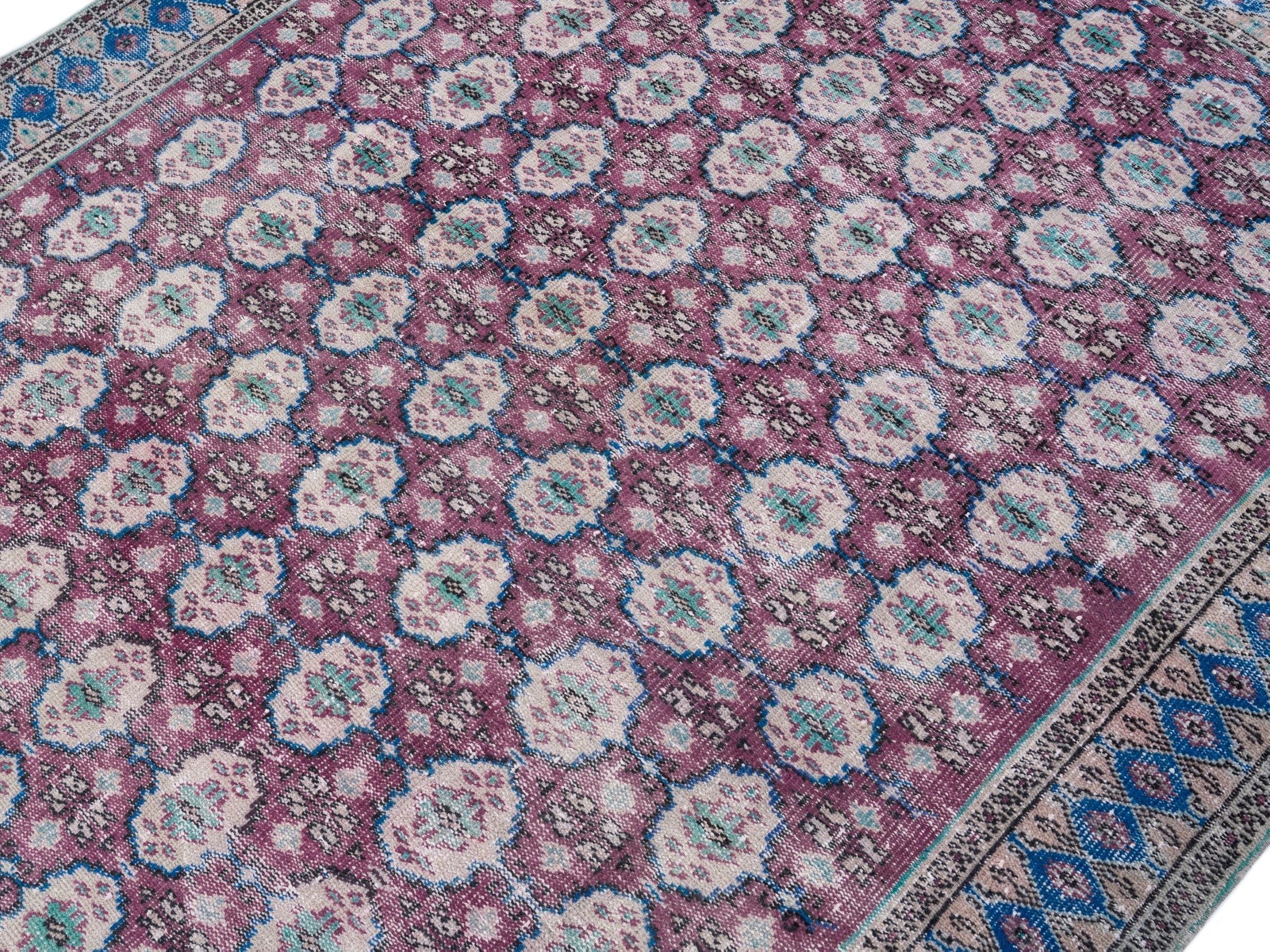 Turkish Manisa area rug in burgundy and navy, view 5 of 10