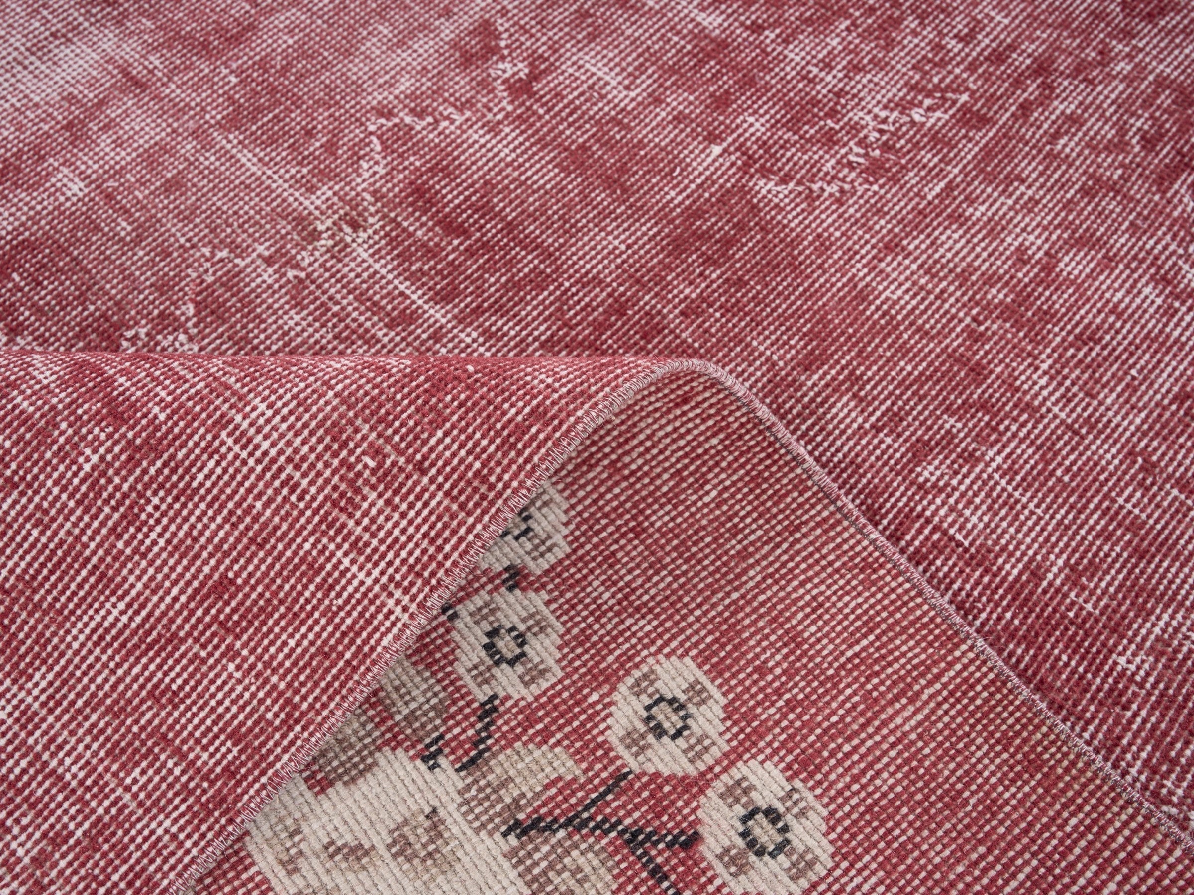 Turkish Isparta area rug in faded red and muted pink, view 9 of 10
