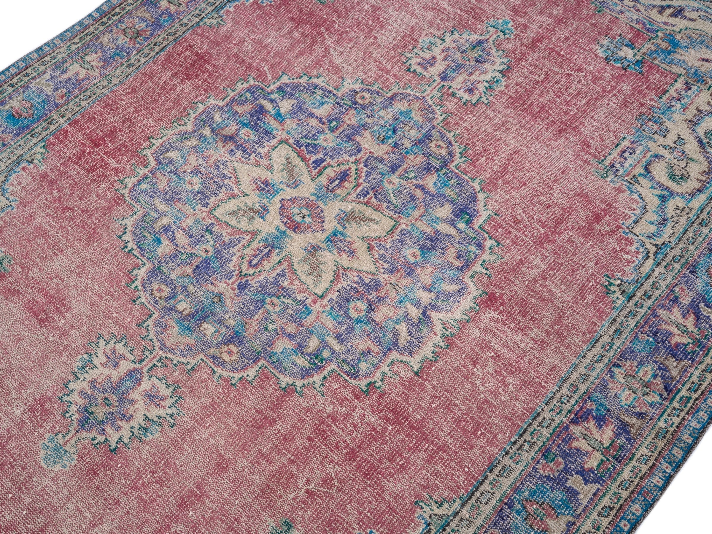 Turkish Manisa area rug in dusty rose and plum, view 5 of 10