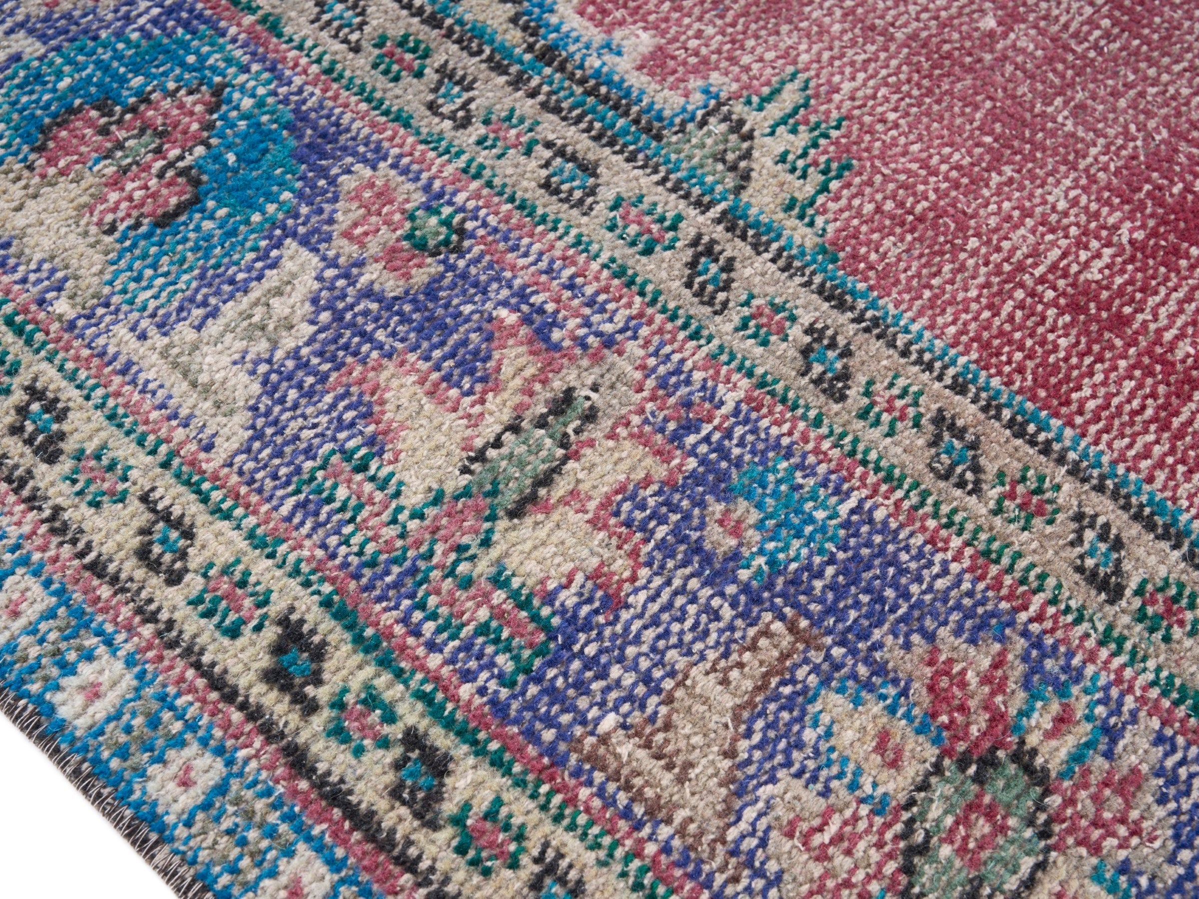 Turkish Manisa area rug in dusty rose and plum, view 6 of 10
