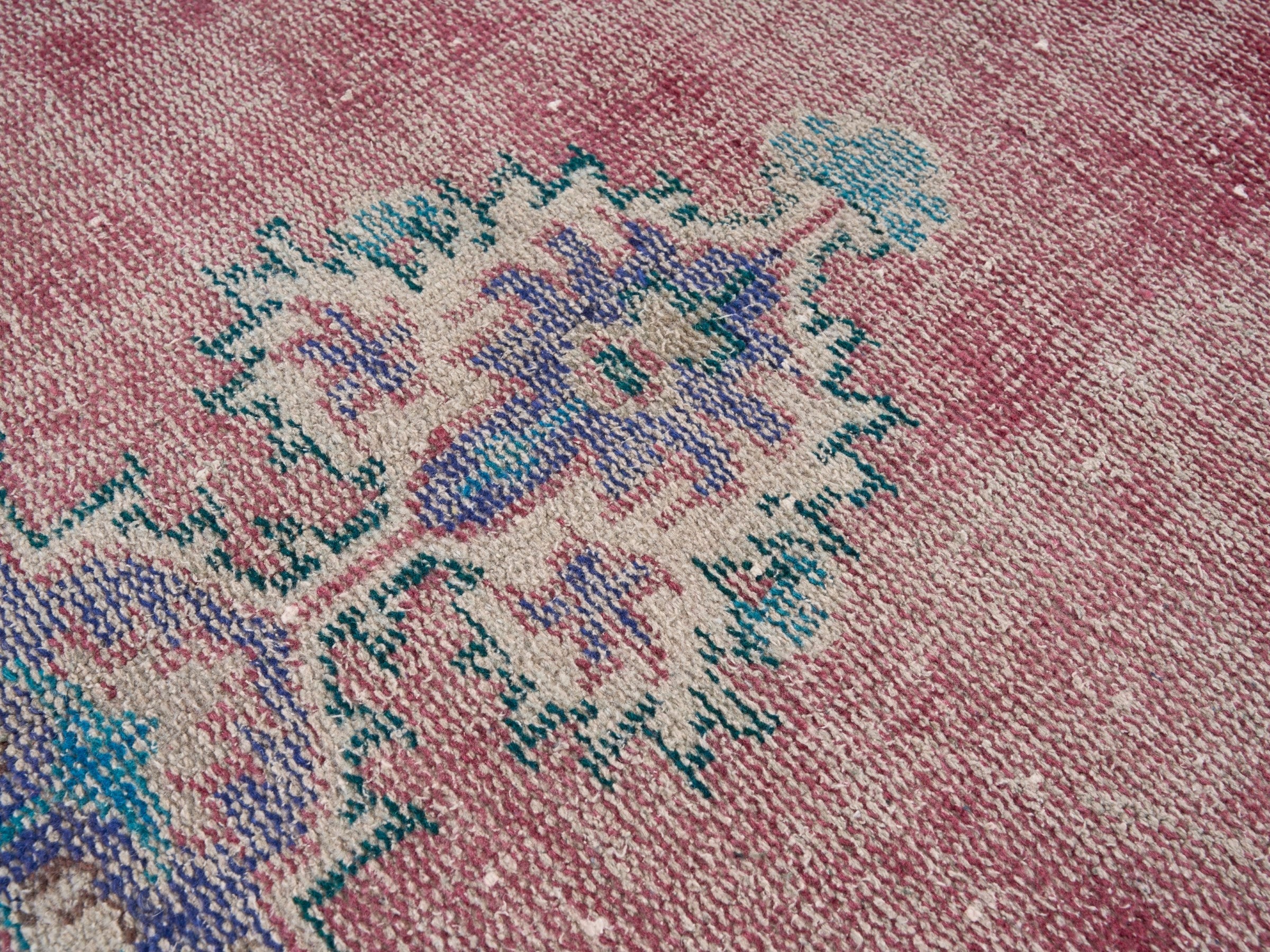 Turkish Manisa area rug in dusty rose and plum, view 7 of 10