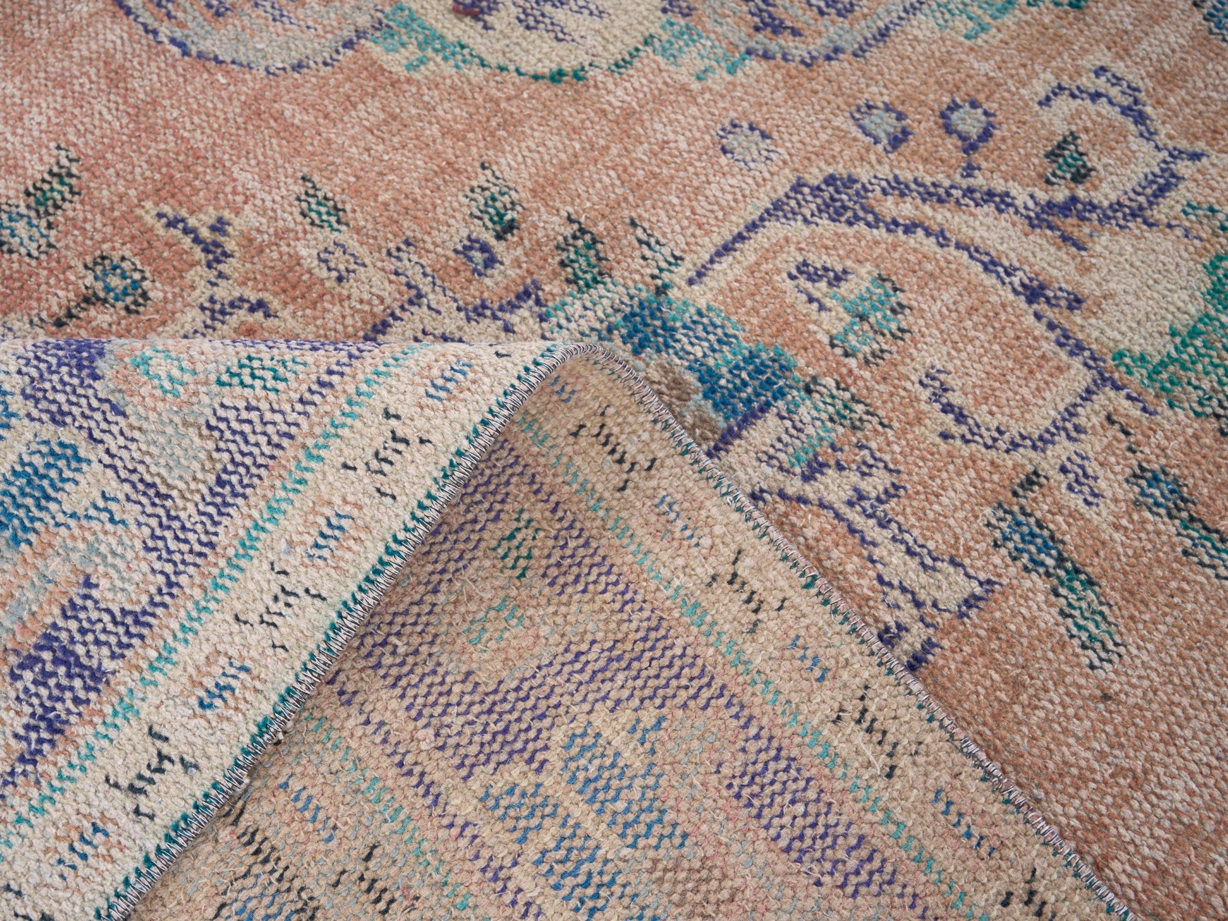 Turkish Manisa area rug in terracotta and navy, view 9 of 10