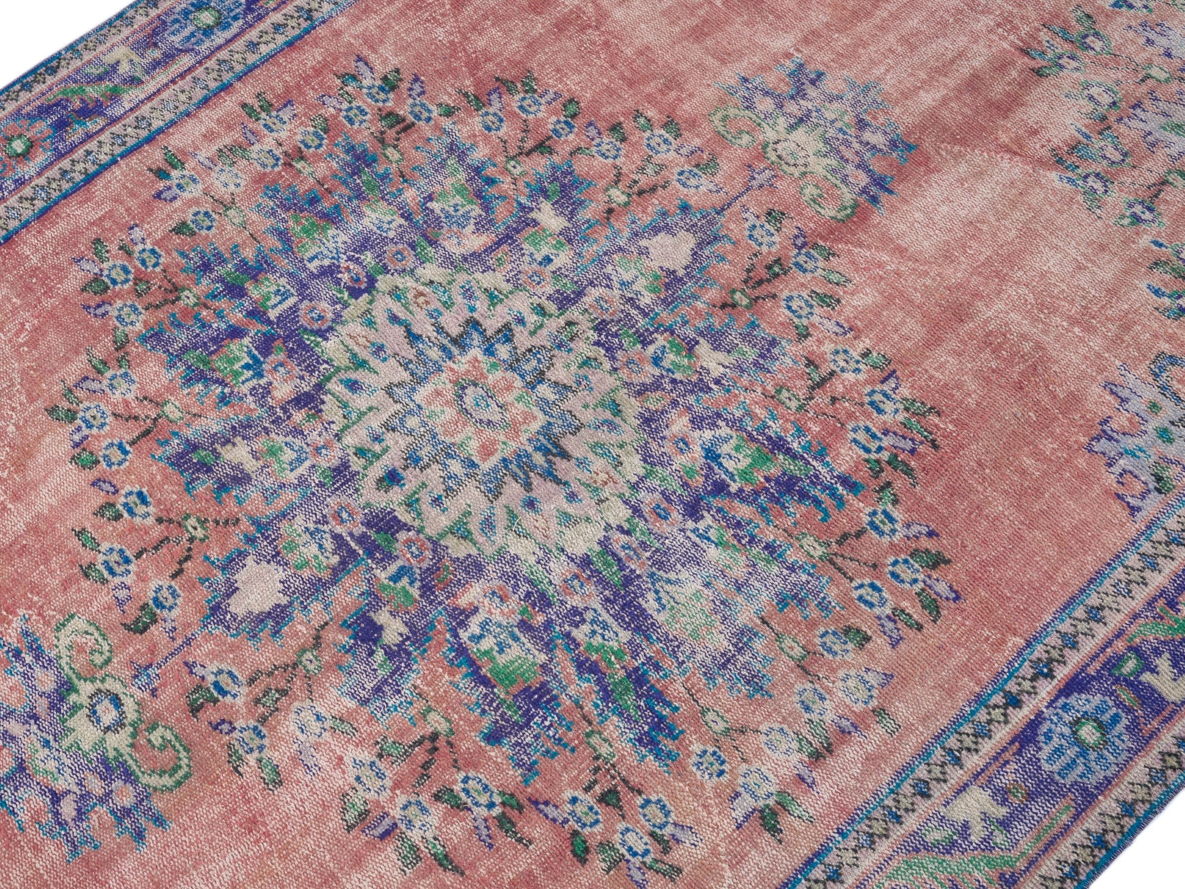 Turkish Manisa area rug in dusty rose and plum, view 5 of 10
