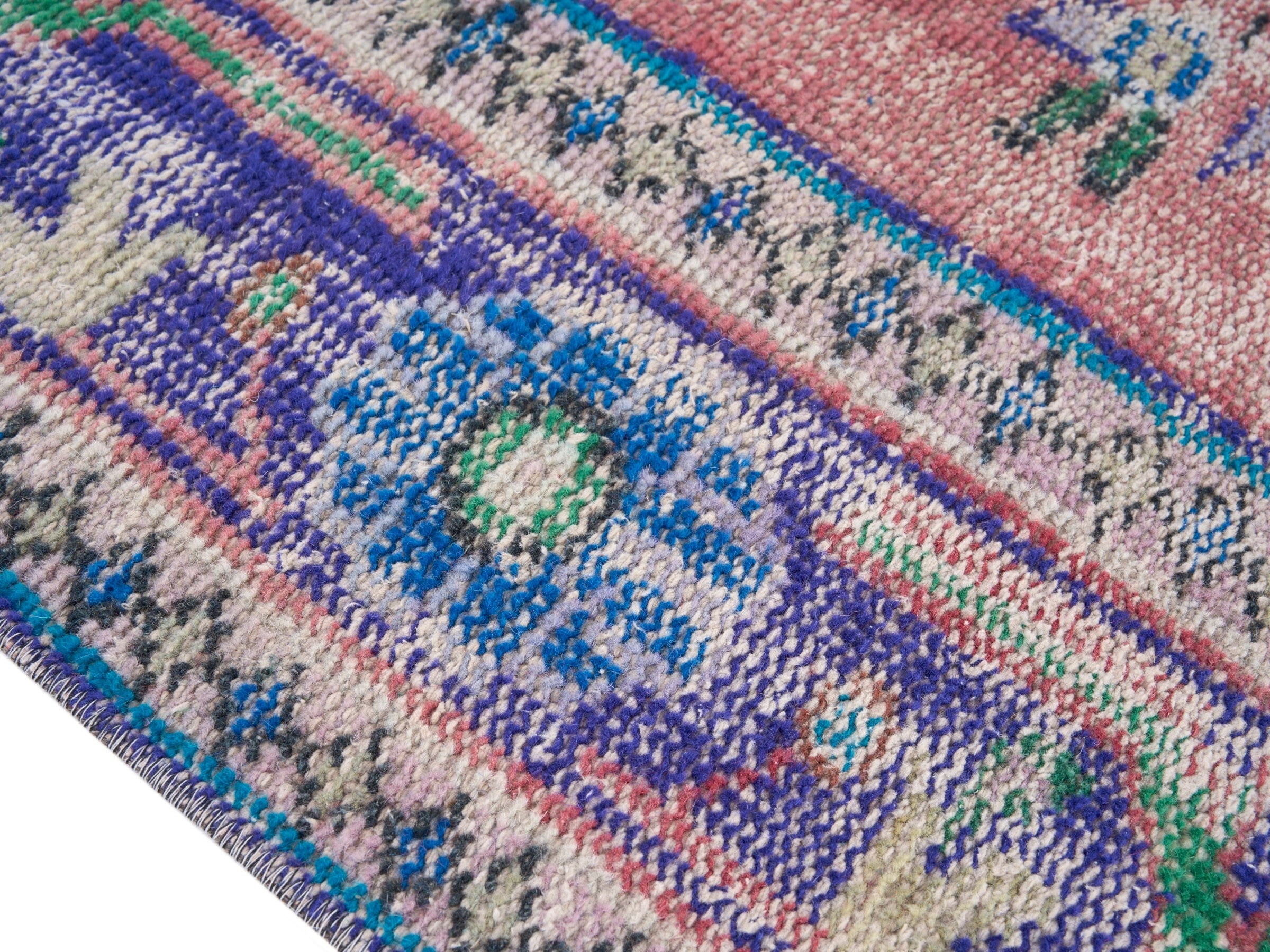 Turkish Manisa area rug in dusty rose and plum, view 6 of 10