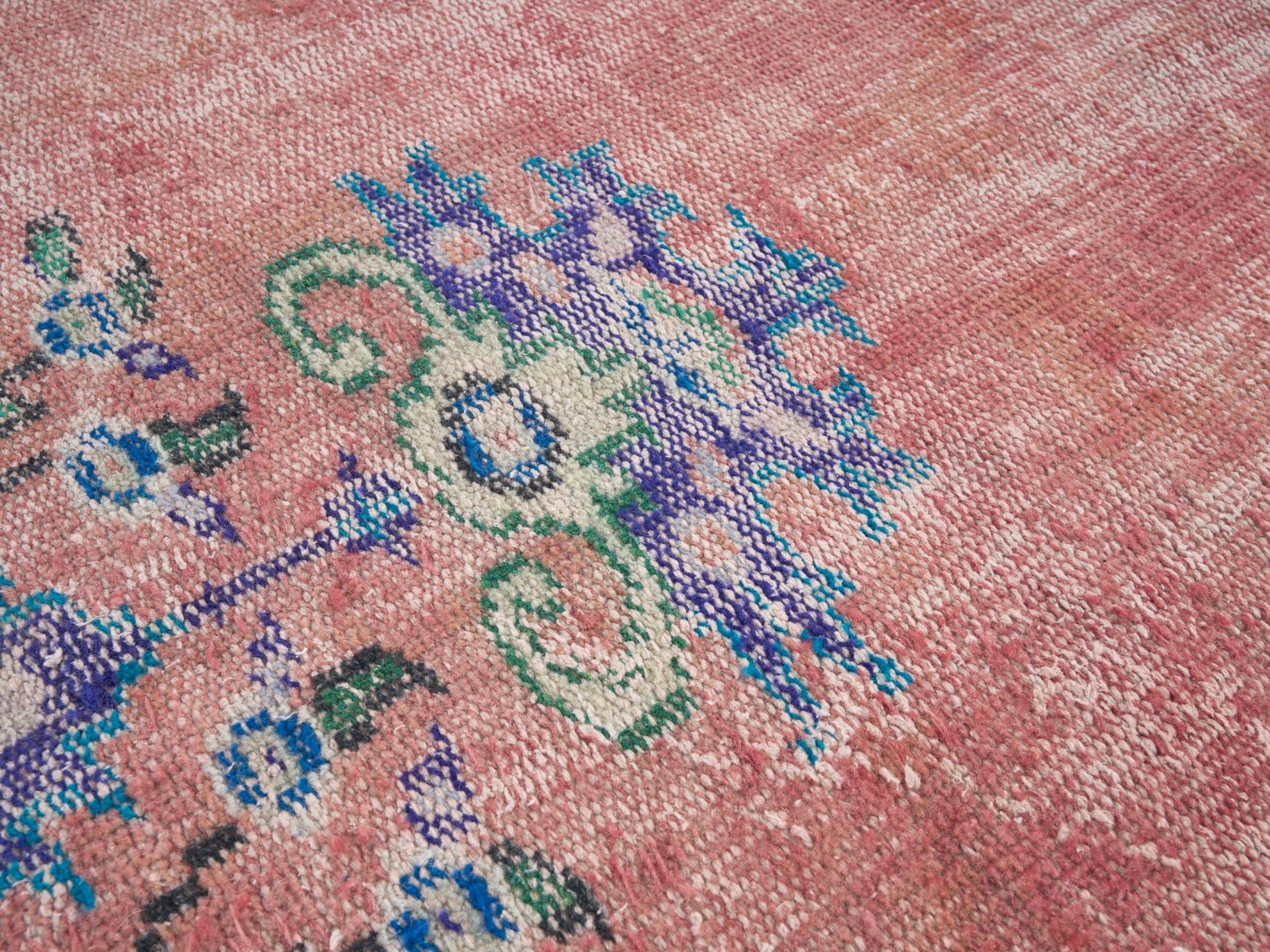 Turkish Manisa area rug in dusty rose and plum, view 7 of 10