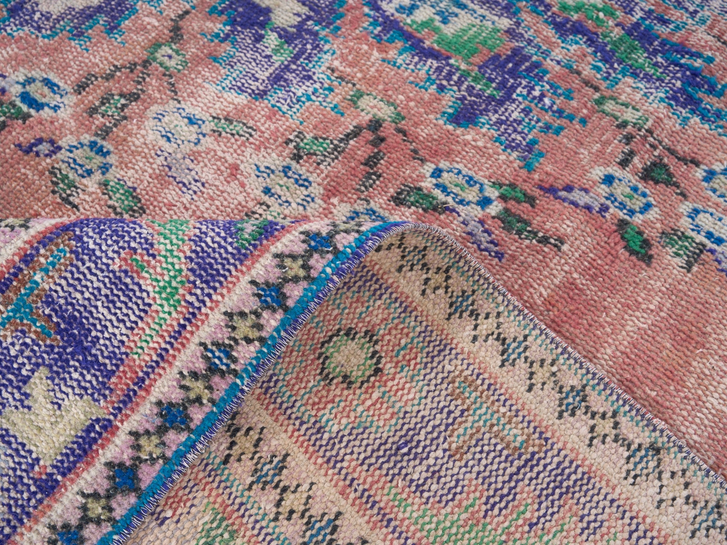 Turkish Manisa area rug in dusty rose and plum, view 9 of 10