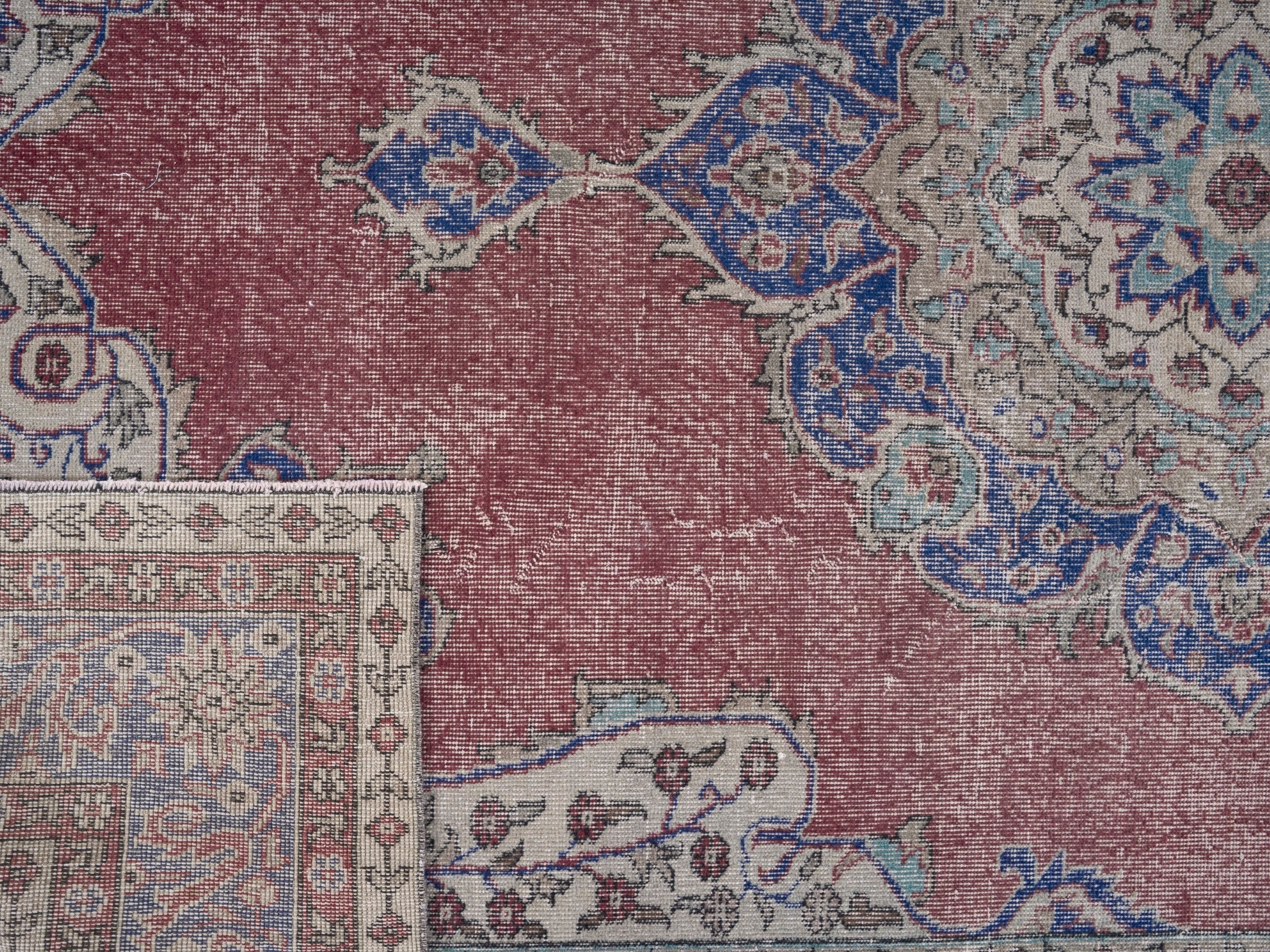 Turkish Isparta area rug in faded red and dark blue, view 7 of 7