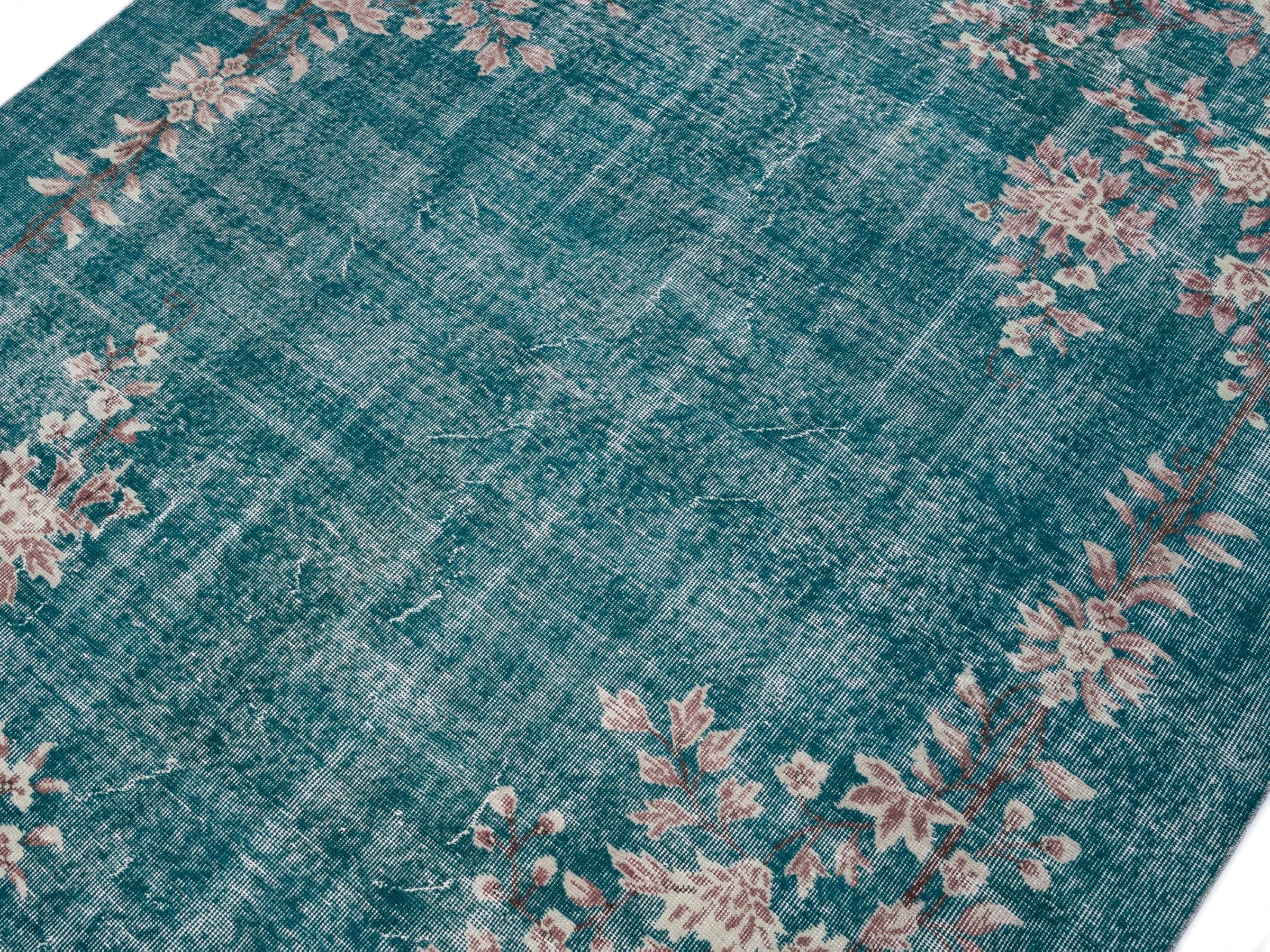 Turkish Isparta area rug in teal and muted pink, view 5 of 10