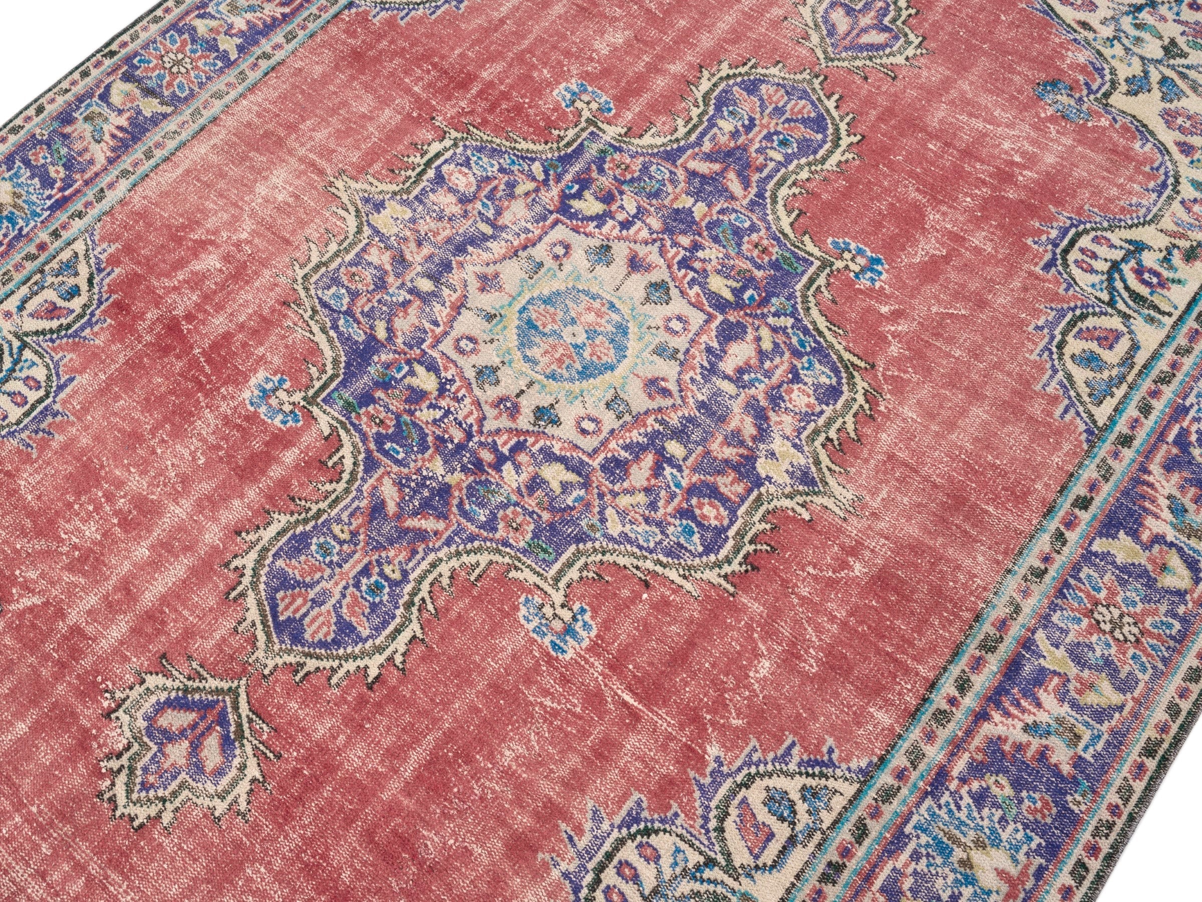 Turkish Manisa area rug in rose and navy, view 5 of 10