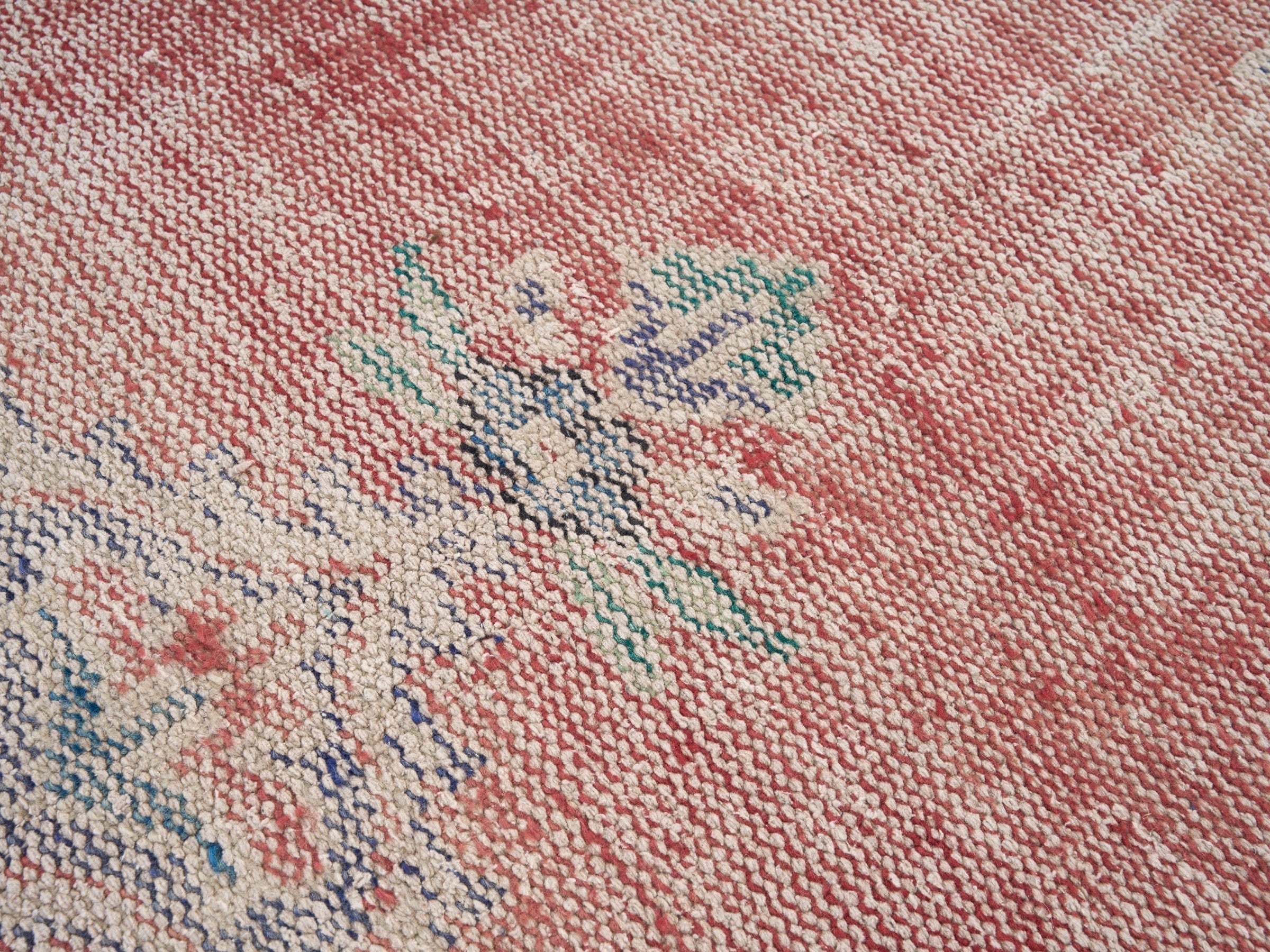 Turkish Manisa area rug in muted pink and navy, view 7 of 10