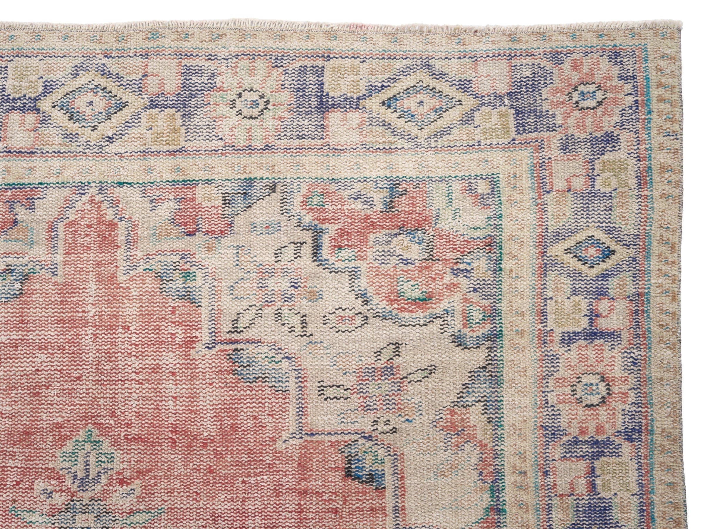 Turkish Manisa area rug in muted pink and navy, view 8 of 10