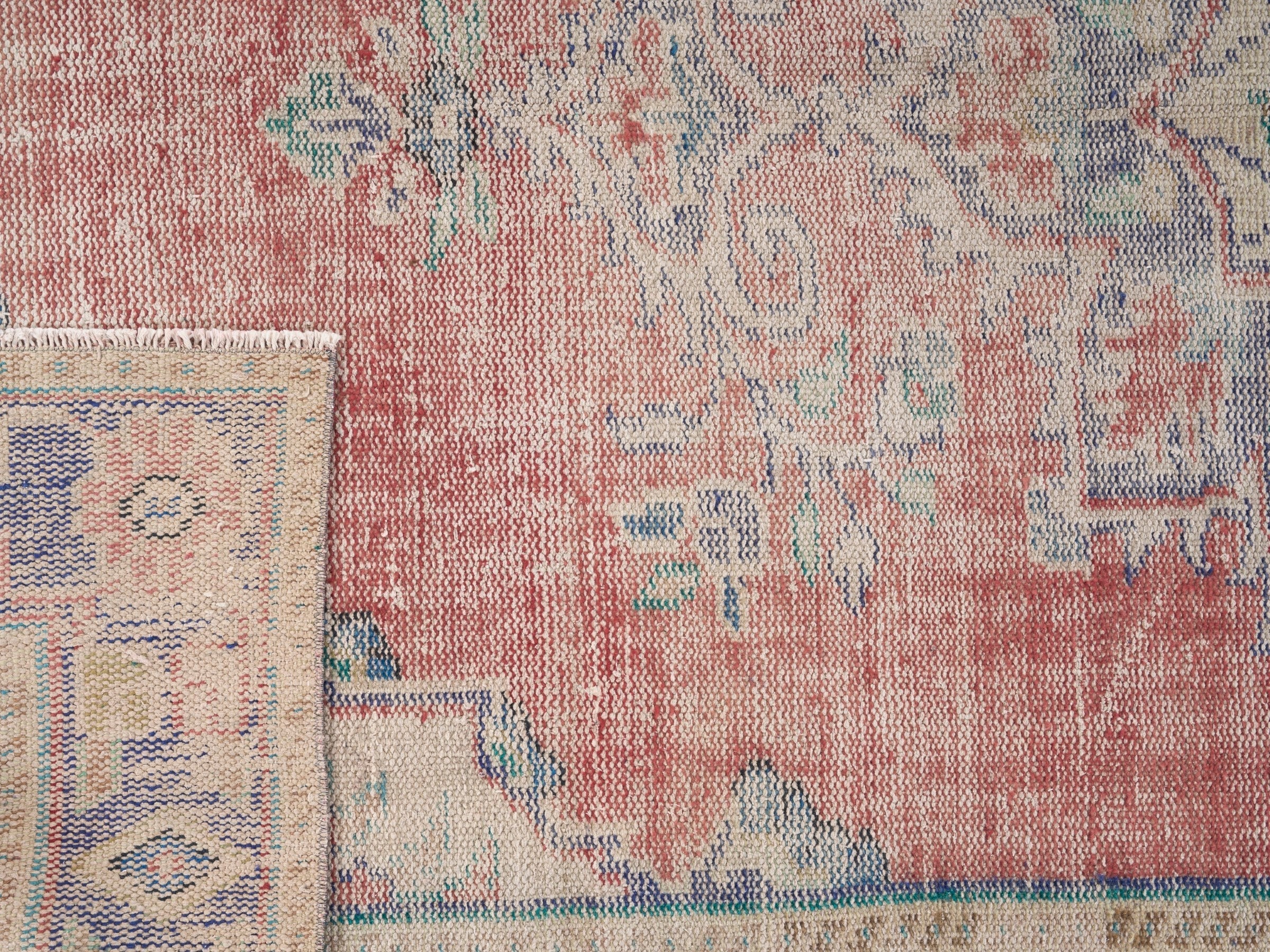 Turkish Manisa area rug in muted pink and navy, view 10 of 10