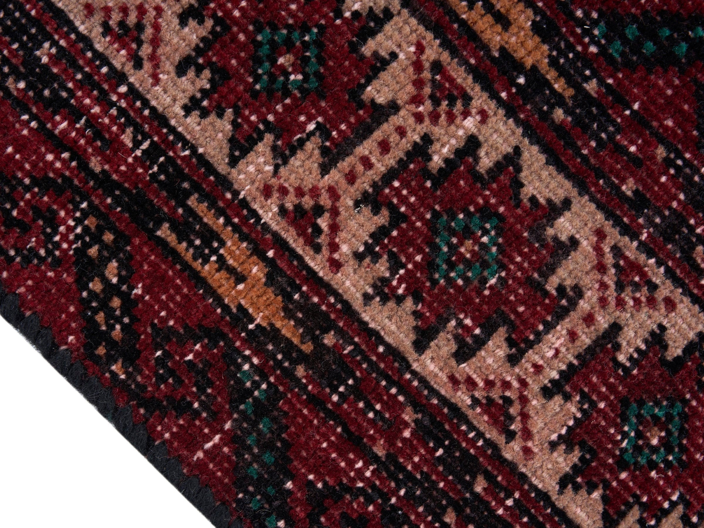 Persian Baluch area rug in deep red and burgundy, view 6 of 10