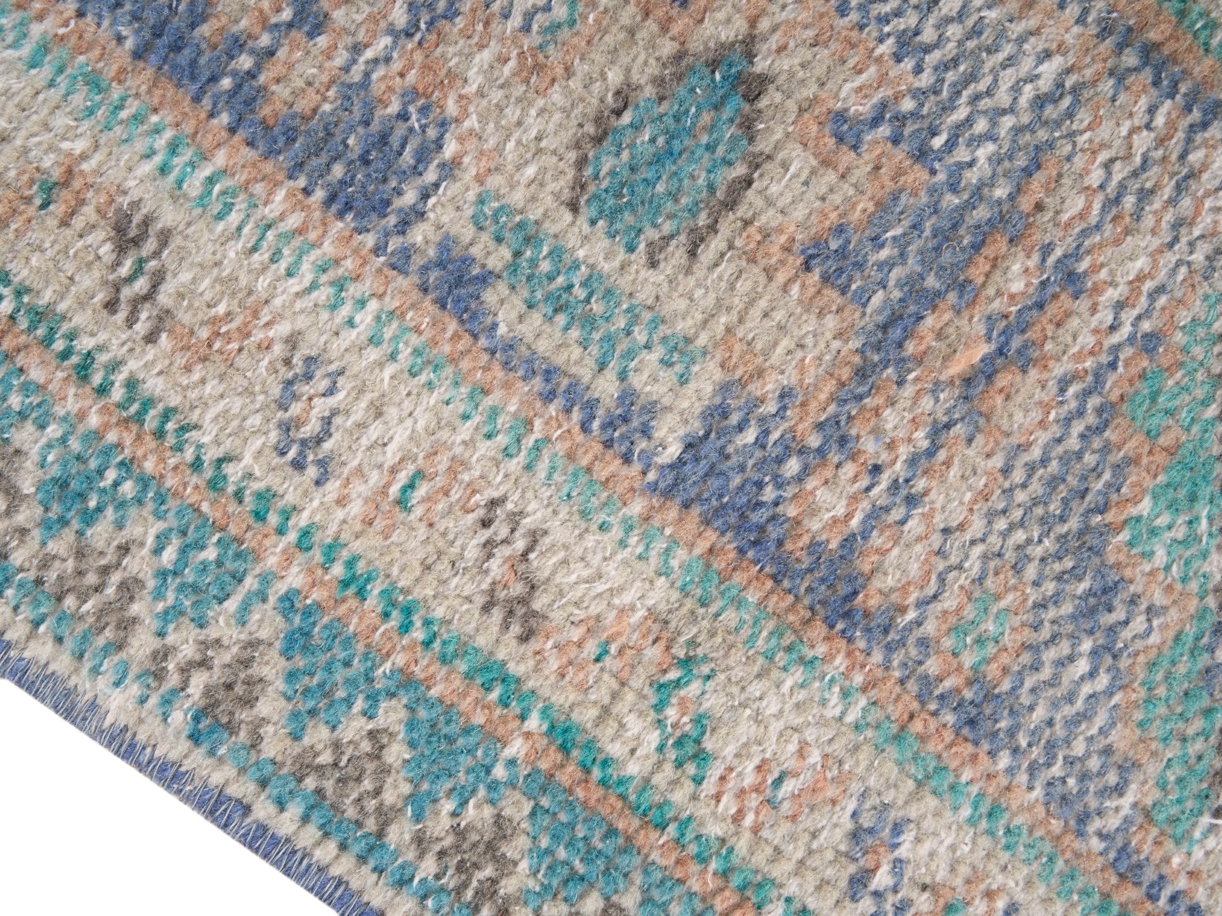 Turkish Manisa area rug in tan and navy, view 6 of 10