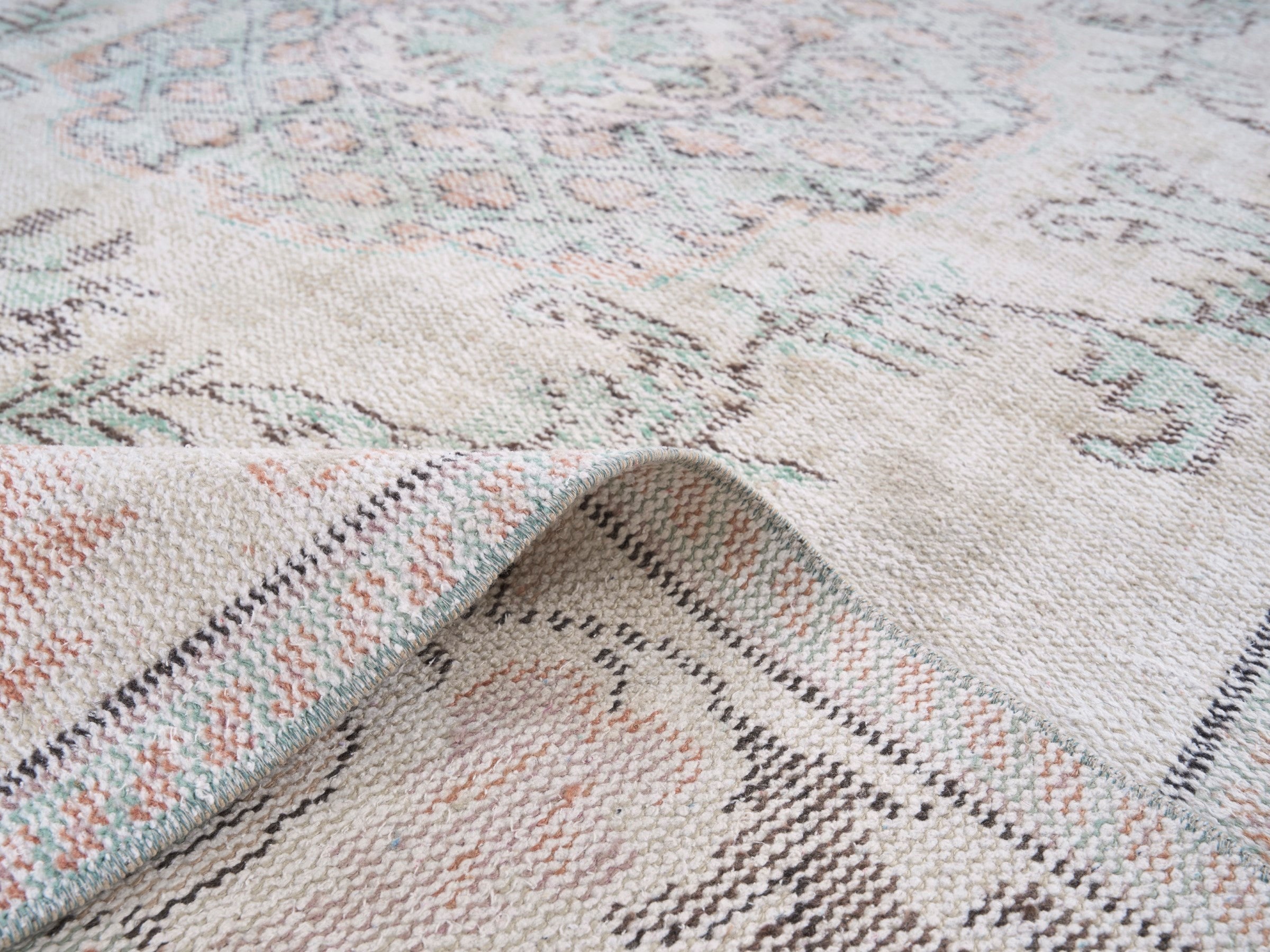 Turkish Manisa area rug in cream and muted pink, view 9 of 10