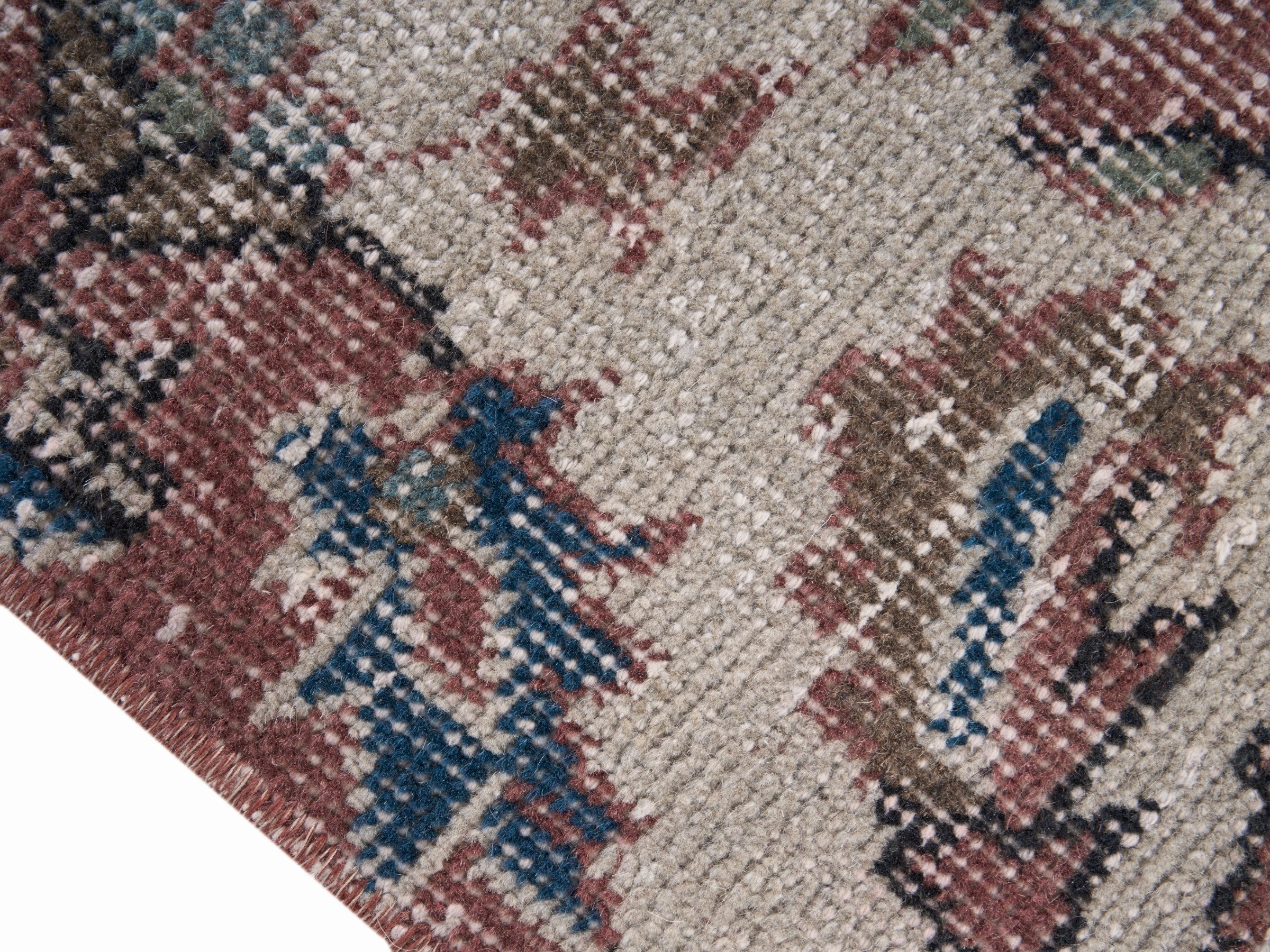 Turkish Isparta area rug in faded red and cream, view 6 of 10