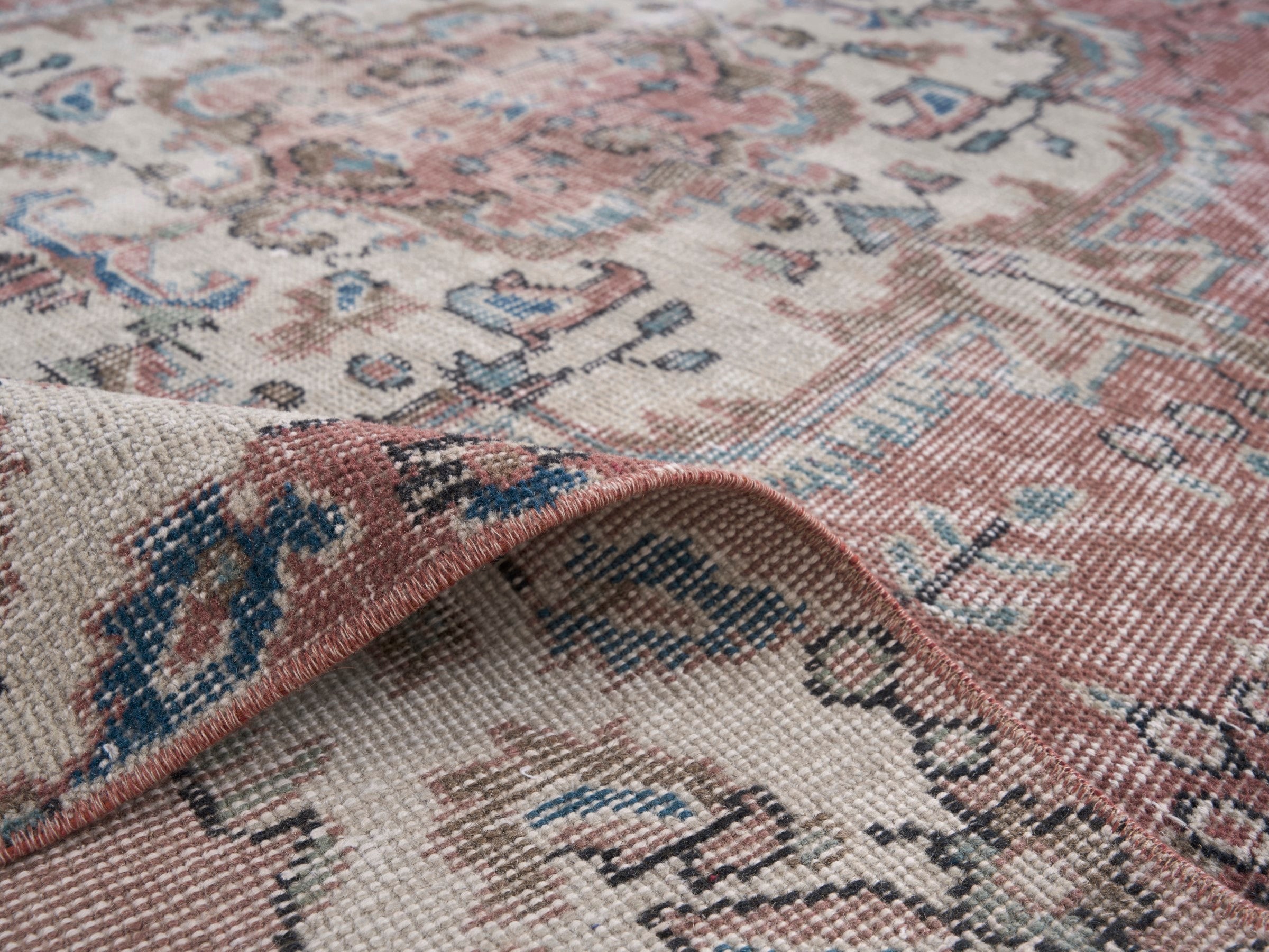 Turkish Isparta area rug in faded red and cream, view 9 of 10