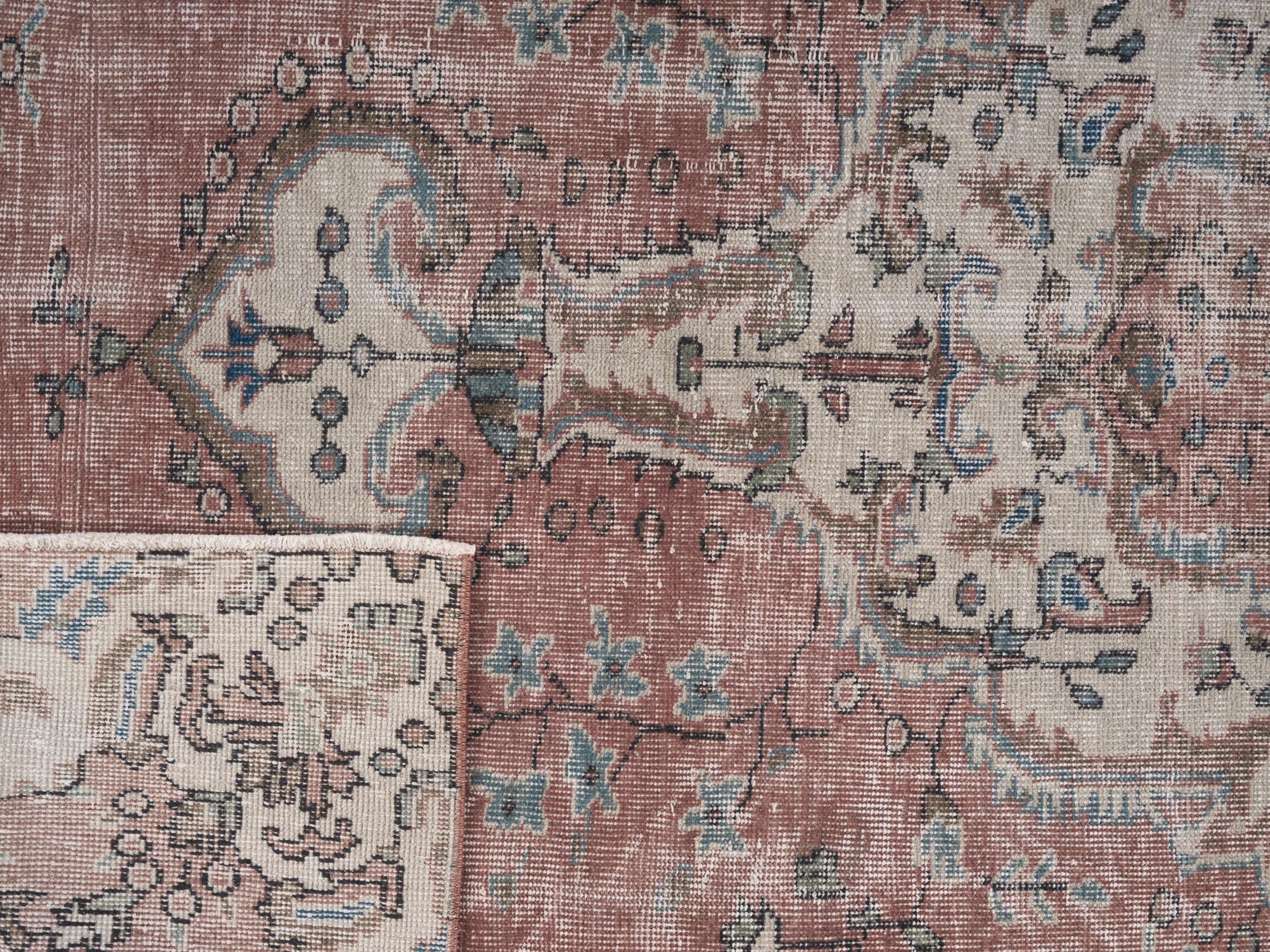 Turkish Isparta area rug in faded red and cream, view 10 of 10