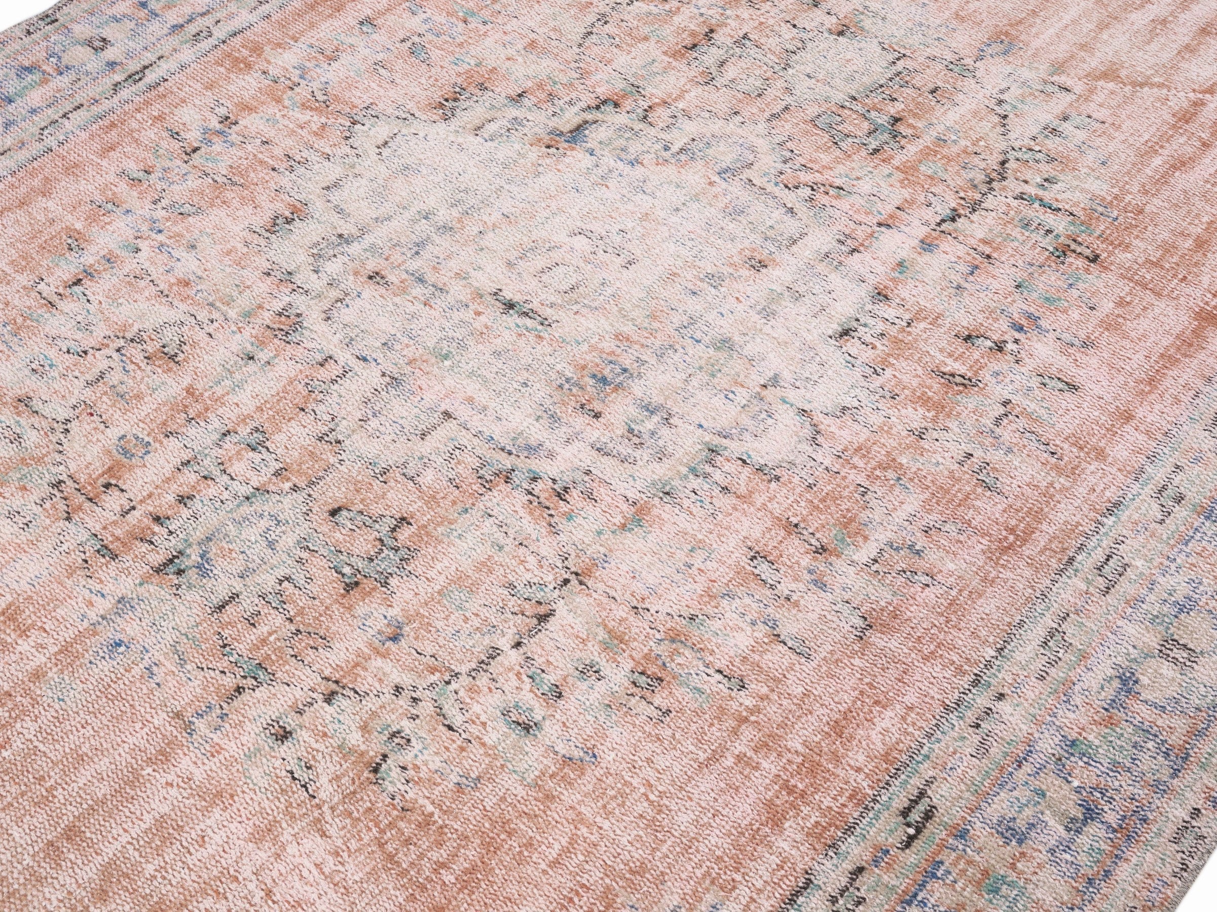 Turkish Manisa area rug in terracotta and dusty blue, view 5 of 10