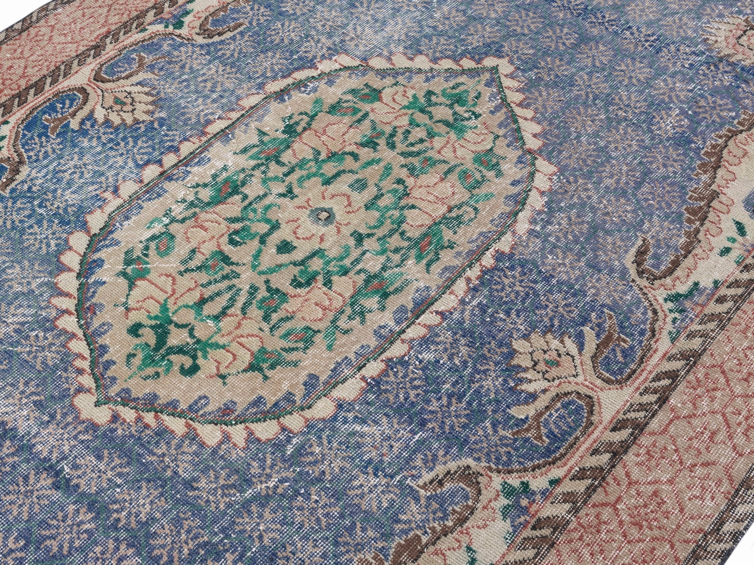 Turkish Isparta area rug in dark blue and rose, view 5 of 10