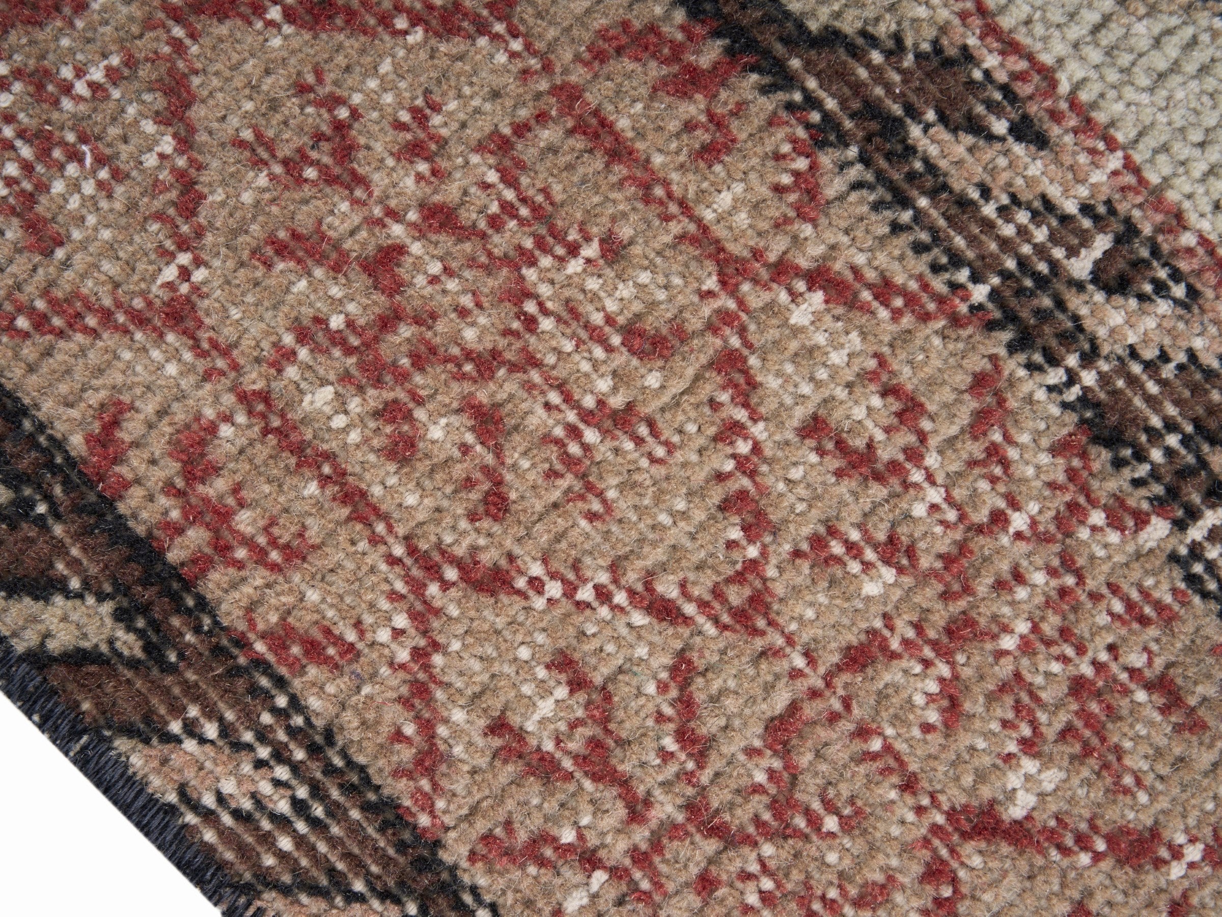 Turkish Isparta area rug in dark blue and rose, view 6 of 10