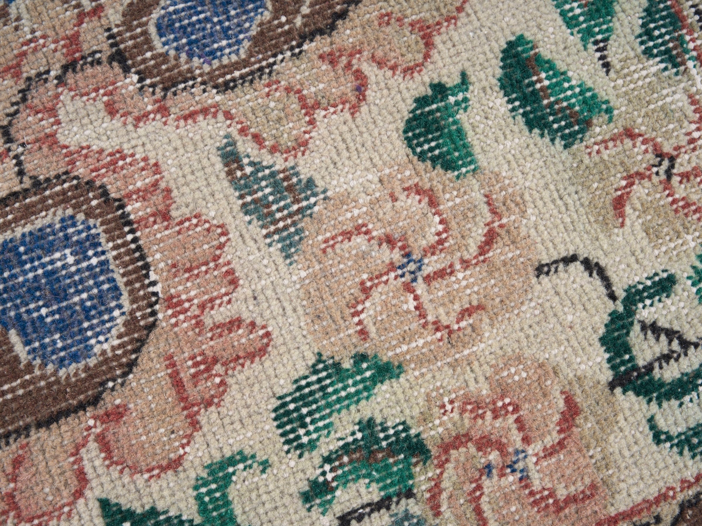 Turkish Isparta area rug in dark blue and rose, view 7 of 10