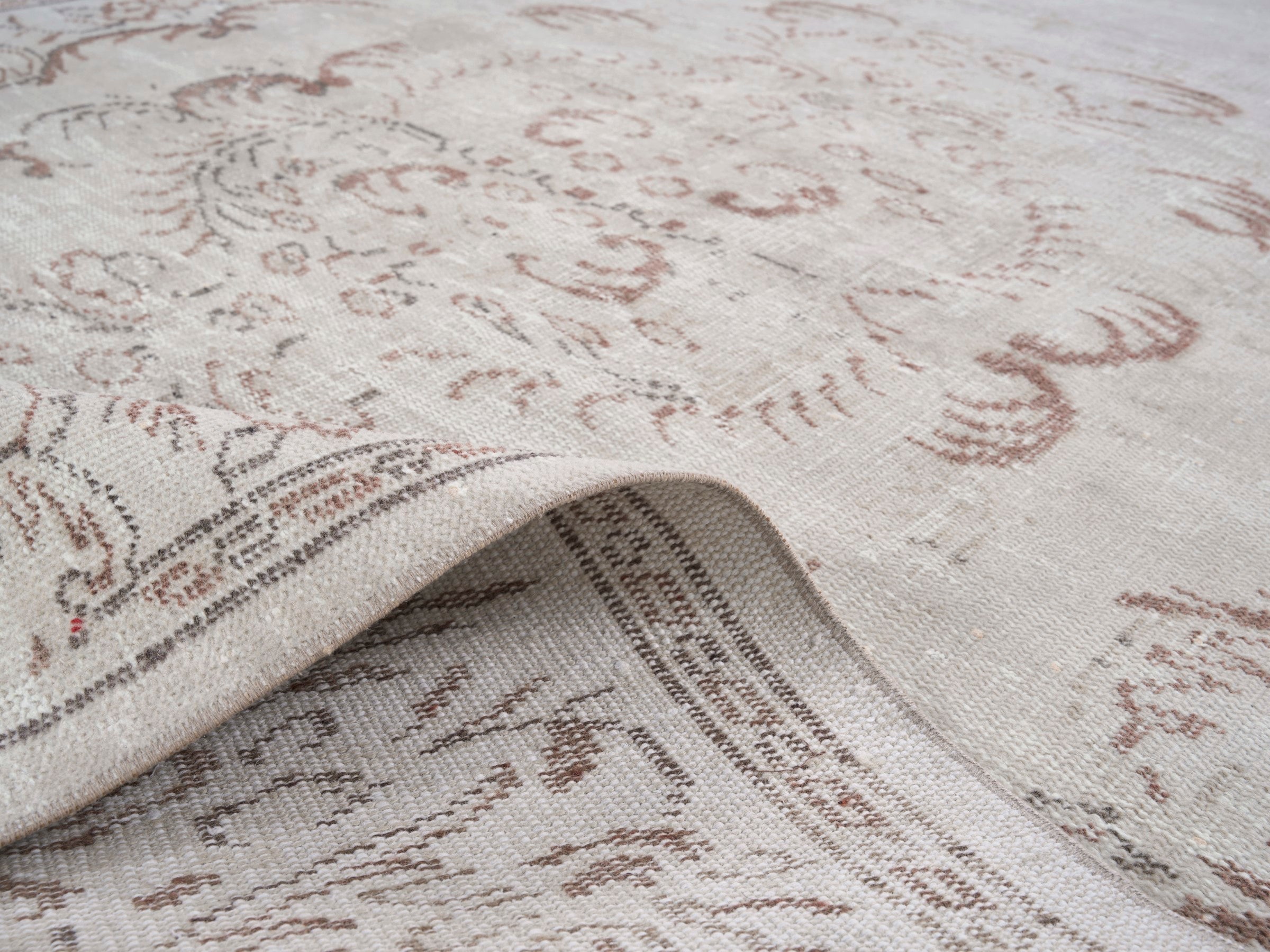 Turkish Manisa area rug in cream and faded red, view 9 of 10