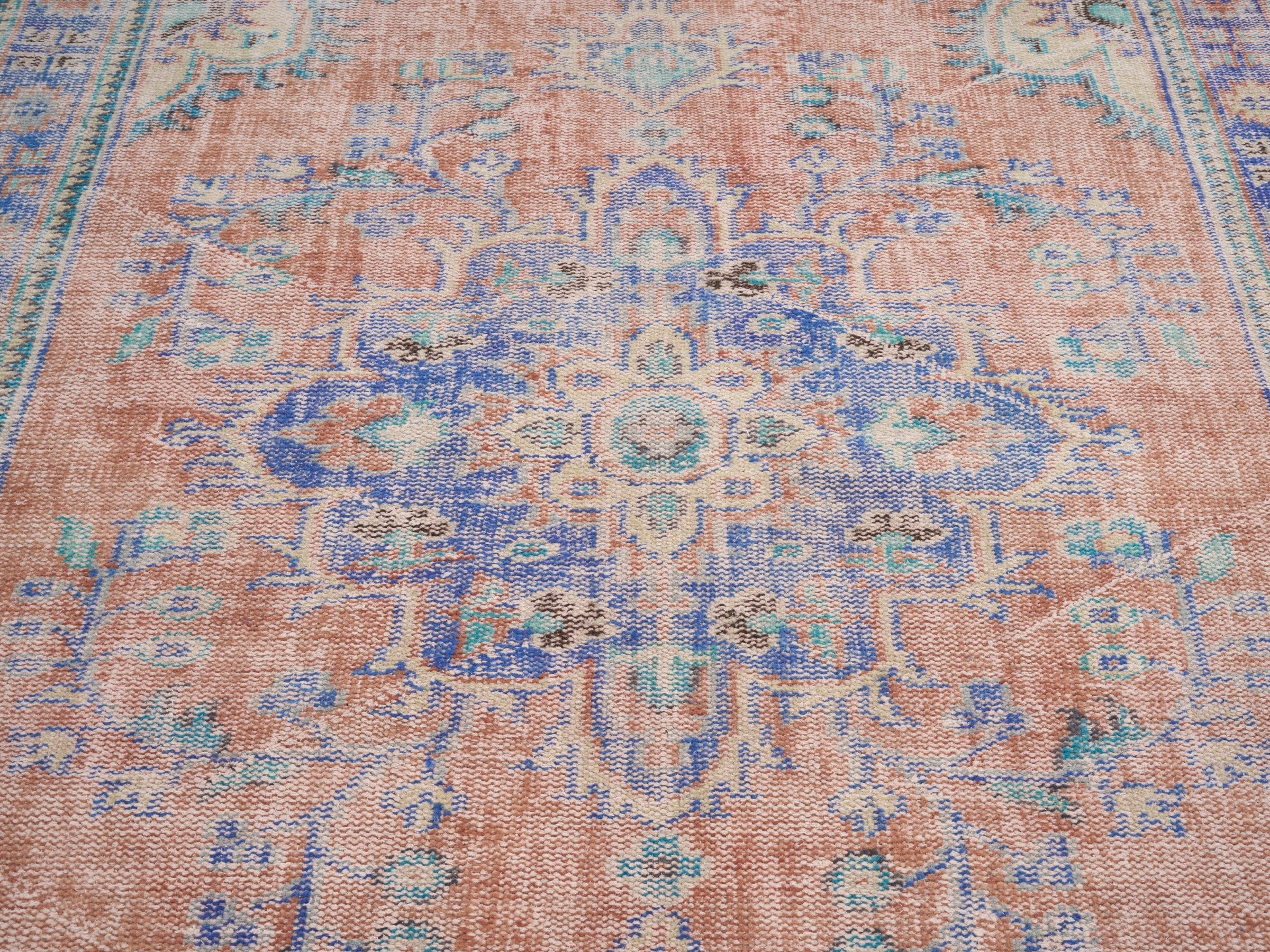Turkish Manisa area rug in terracotta and navy, view 4 of 10