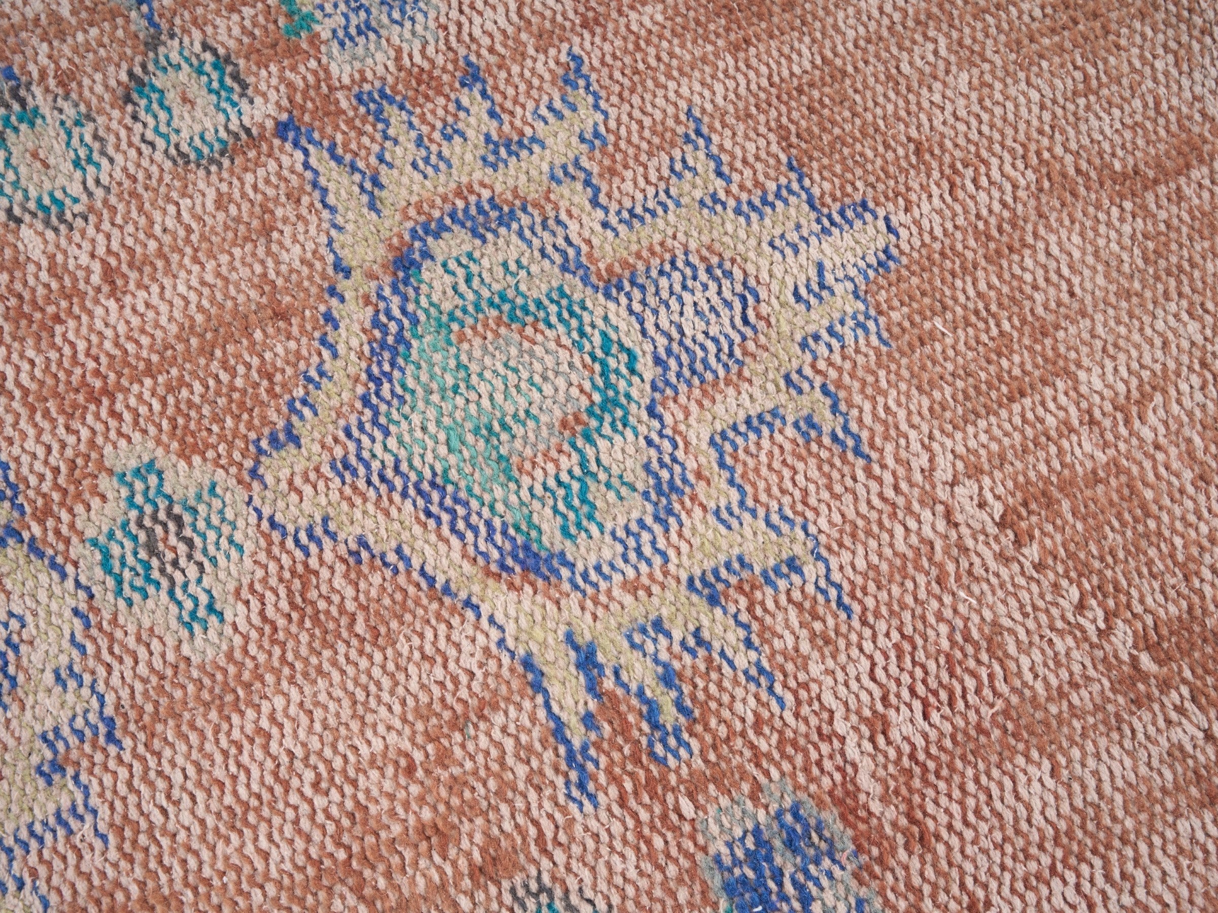 Turkish Manisa area rug in terracotta and navy, view 7 of 10
