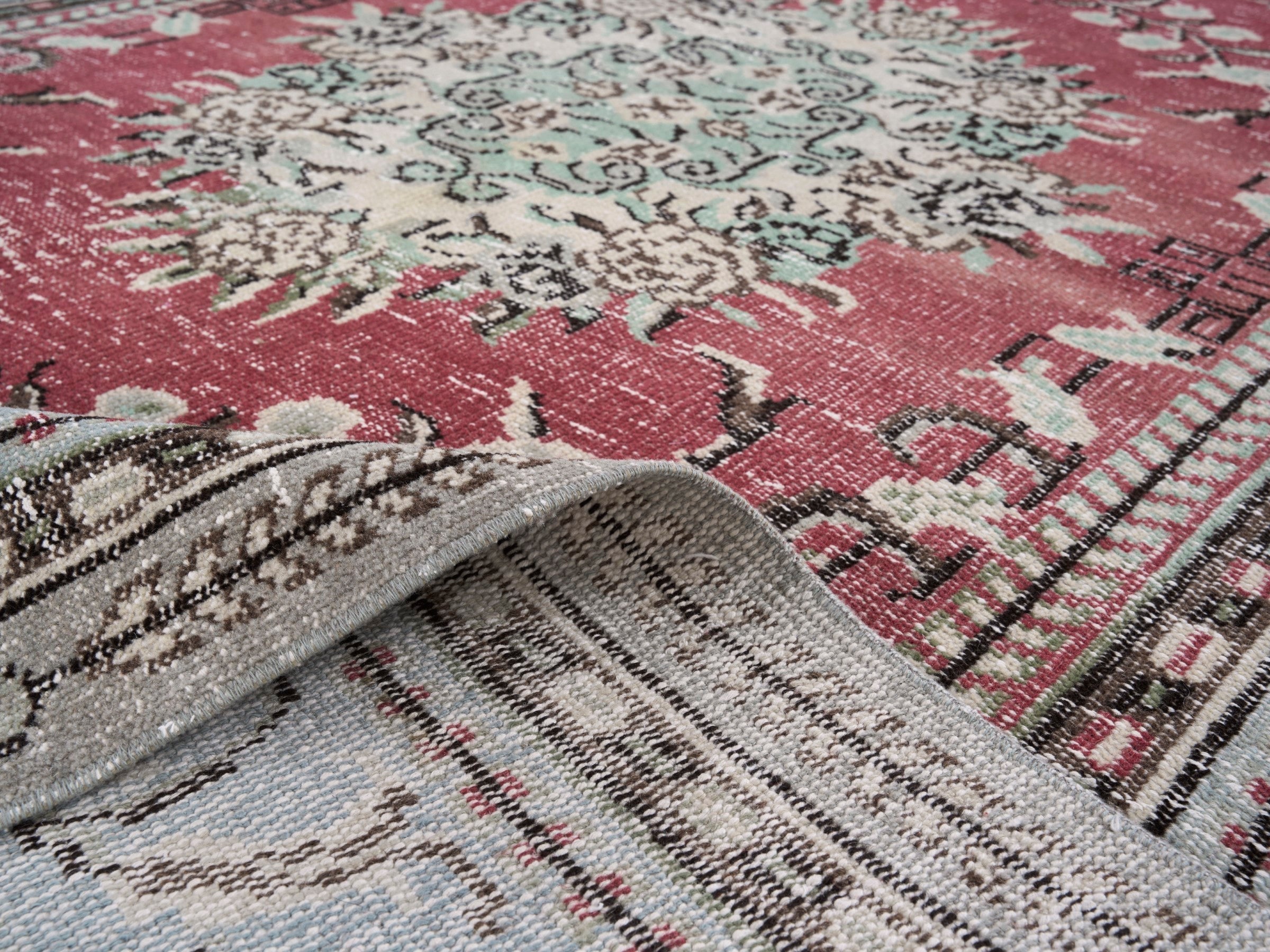Turkish Manisa oversized rug in faded red and cream, view 9 of 10
