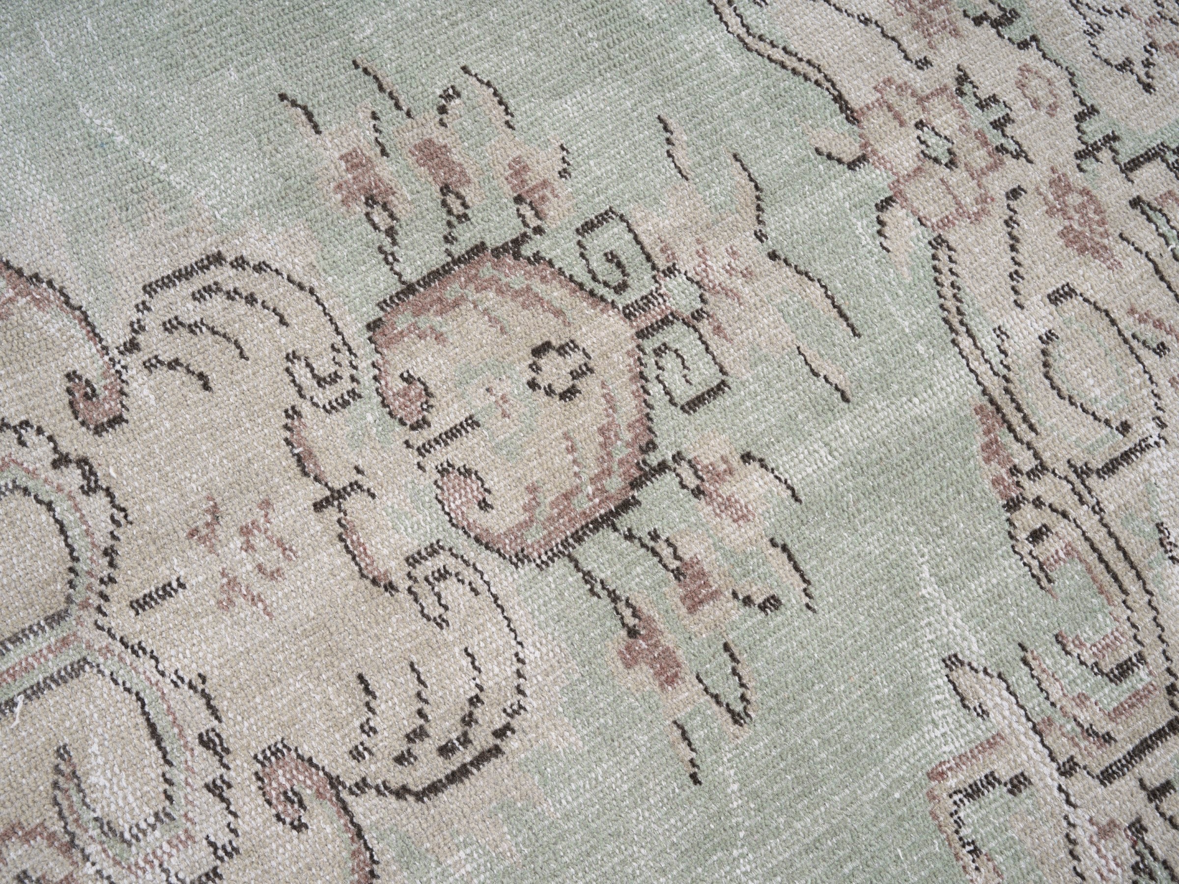 Turkish Manisa area rug in sage and faded red, view 7 of 10