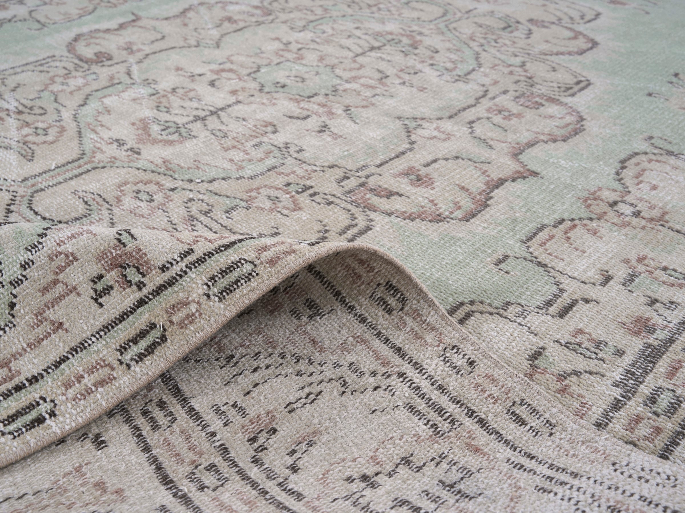 Turkish Manisa area rug in sage and faded red, view 9 of 10