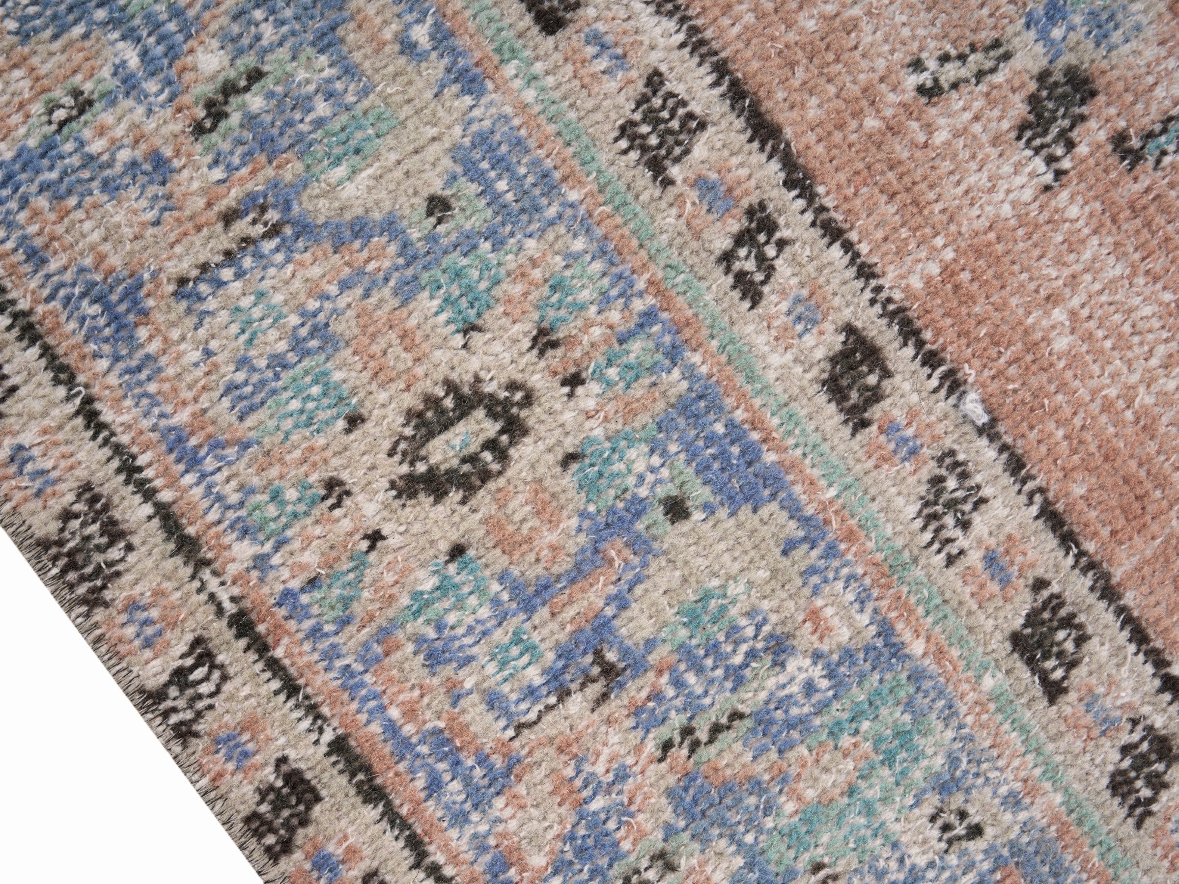 Turkish Manisa area rug in terracotta and denim, view 6 of 10