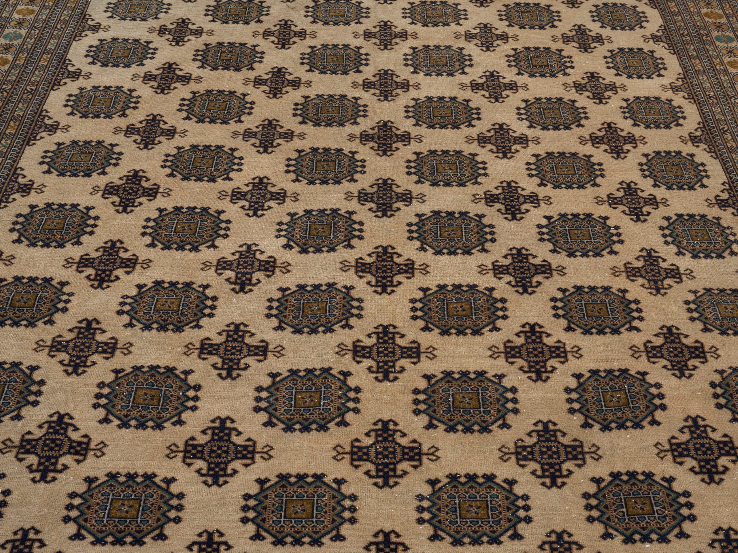 Persian Torkaman area rug in cream and navy, view 4 of 15