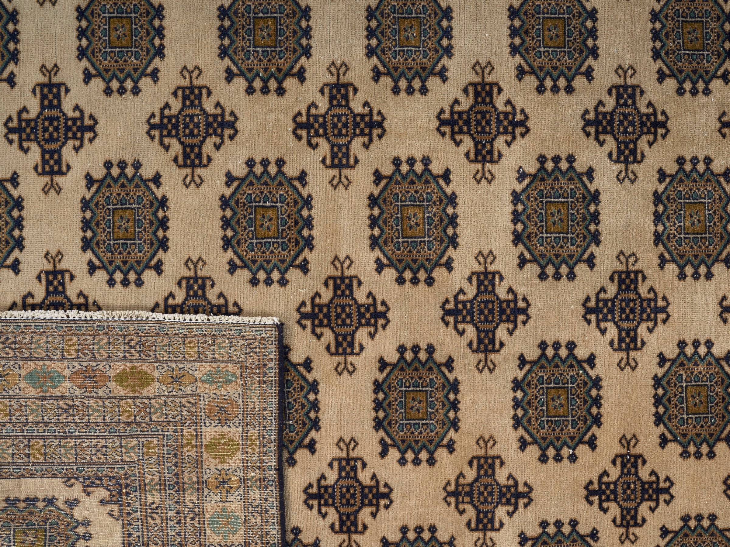 Persian Torkaman area rug in cream and navy, view 15 of 15