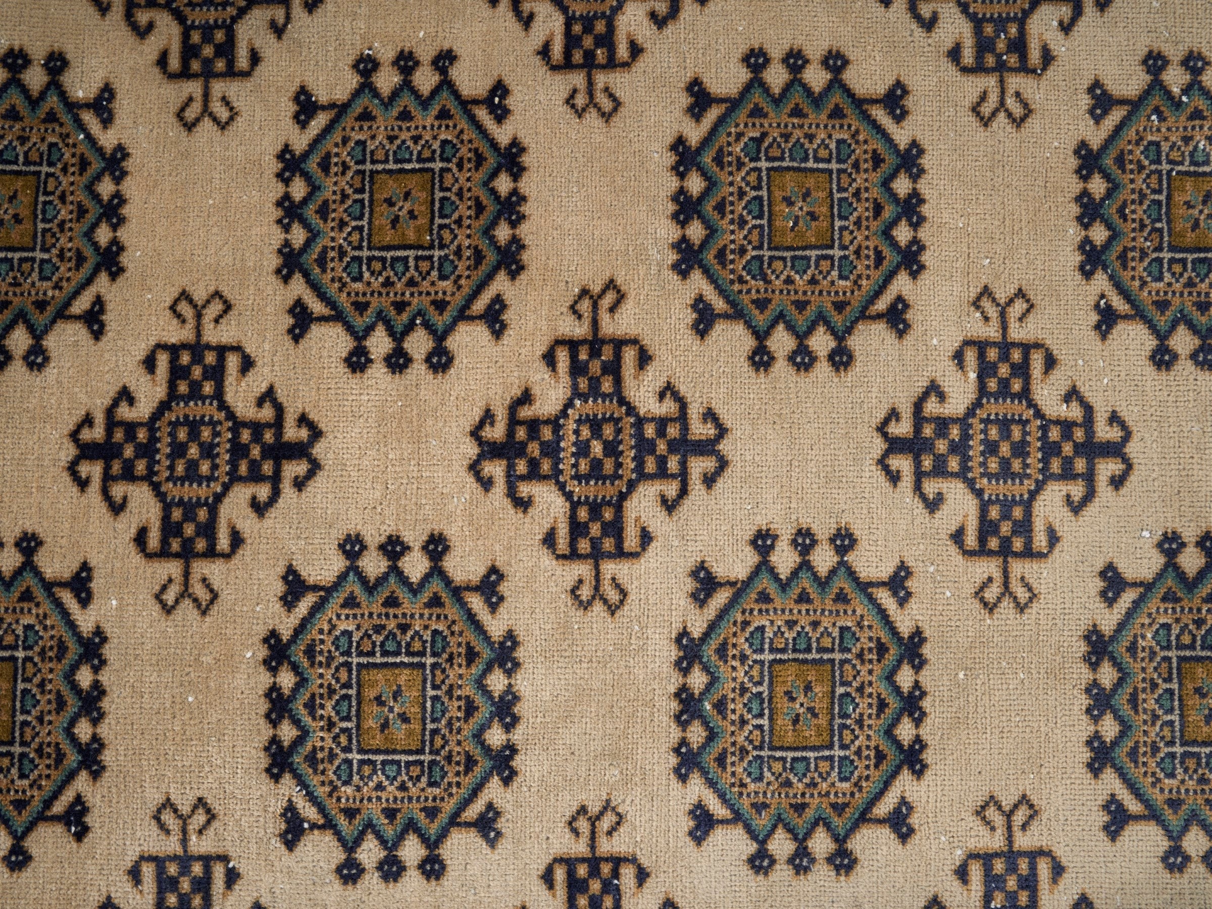 Persian Torkaman area rug in cream and navy, view 11 of 15
