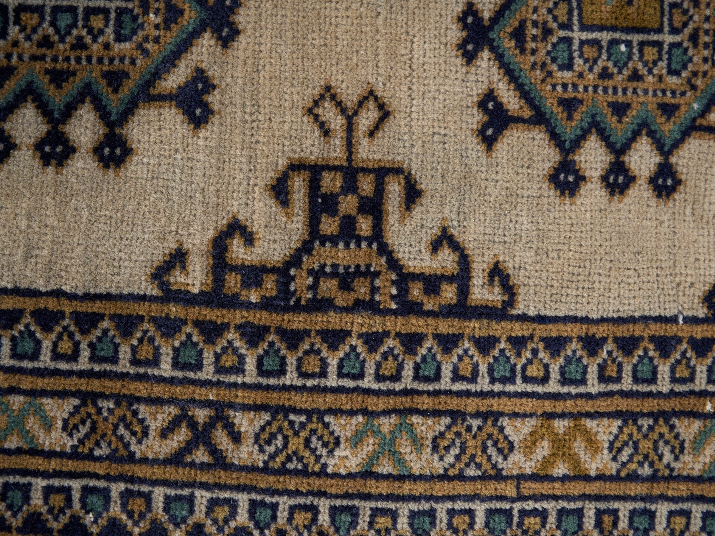 Persian Torkaman area rug in cream and navy, view 13 of 15