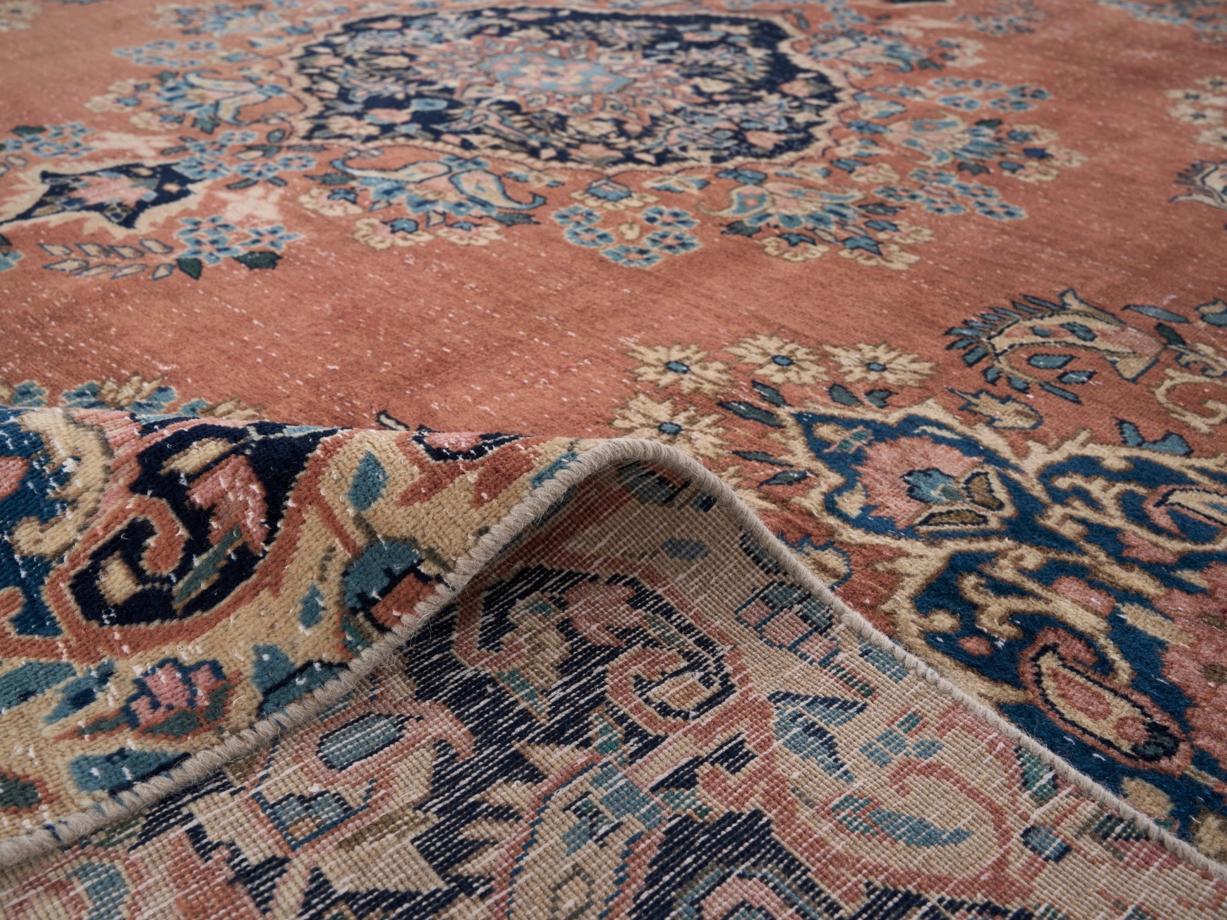 Persian Kerman oversized rug in terracotta and navy, view 14 of 15