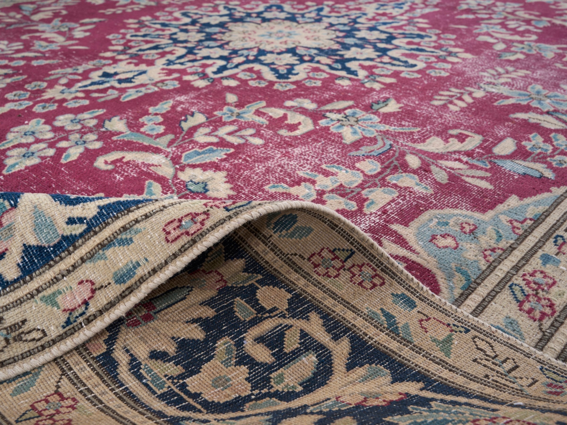 Persian Mashhad oversized rug in magenta and navy, view 14 of 15