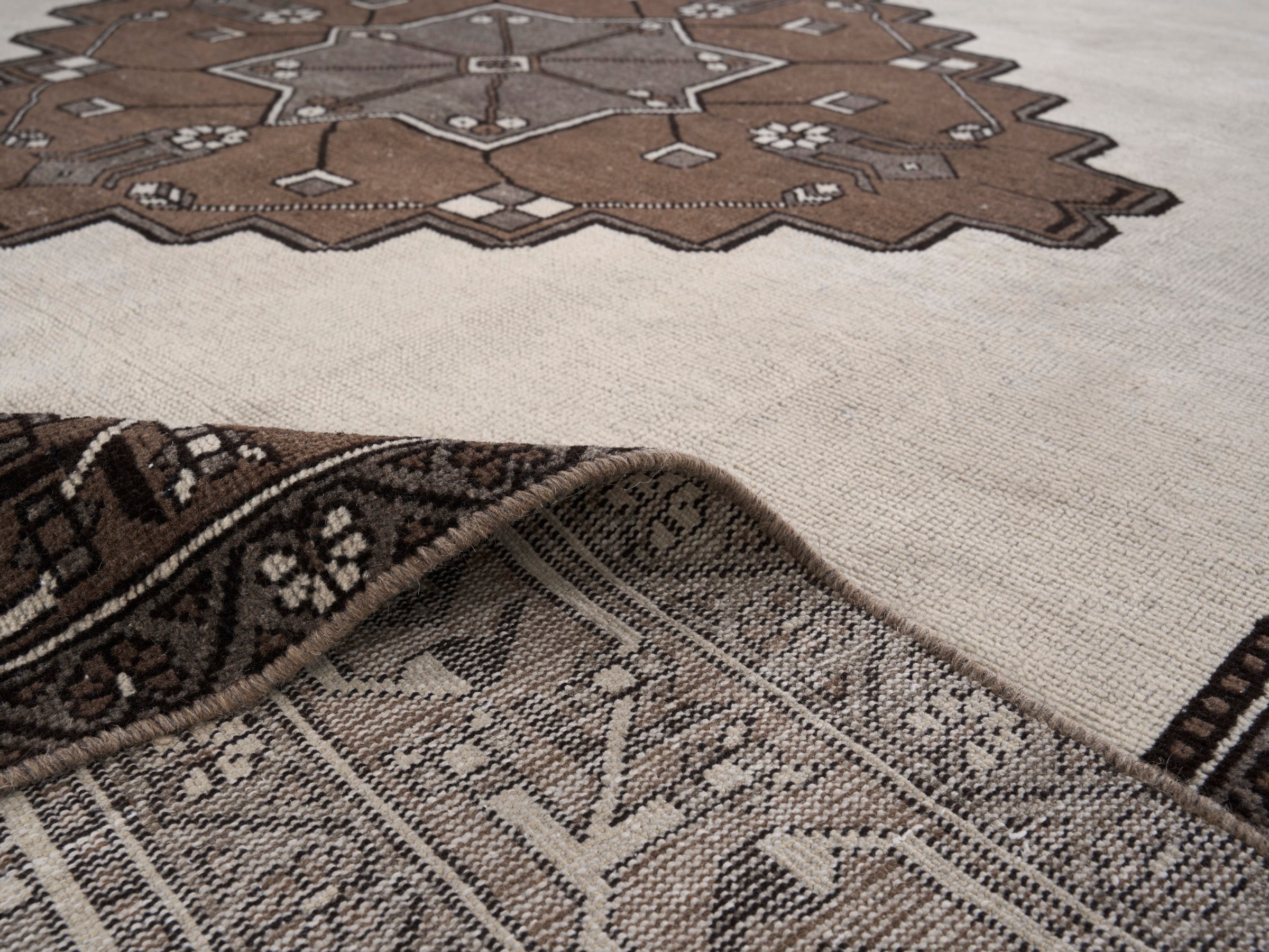 Persian Ferdos oversized rug in cream and dark brown, view 14 of 15