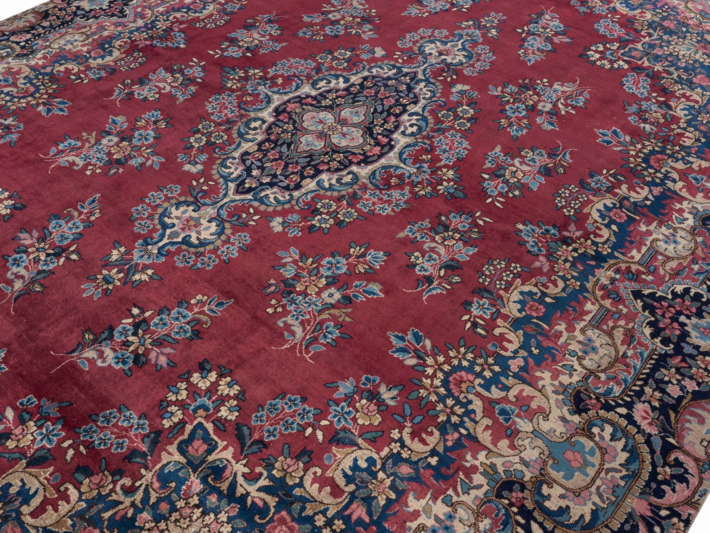 Persian Kerman oversized rug in deep red and navy, view 5 of 15