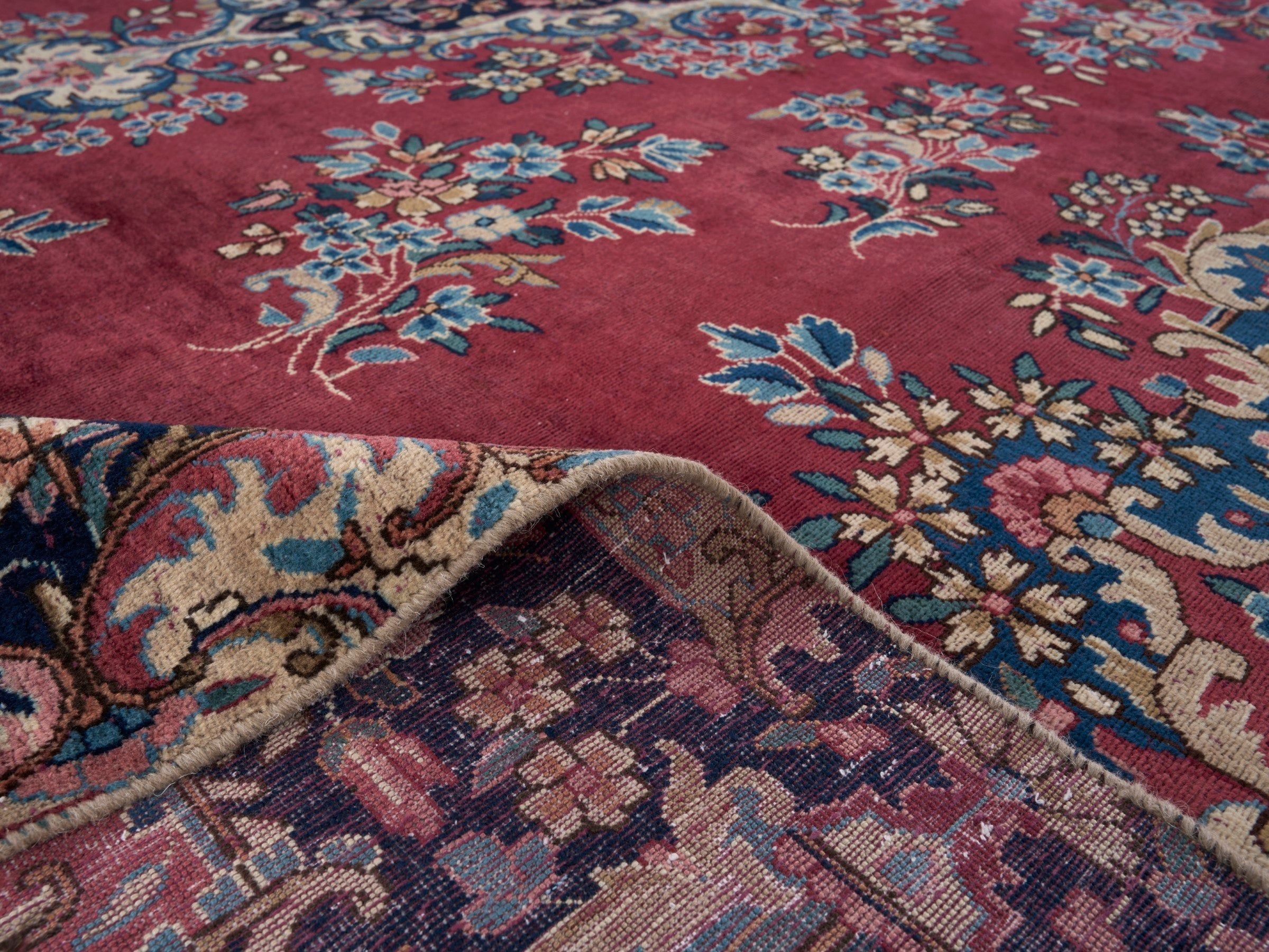 Persian Kerman oversized rug in deep red and navy, view 14 of 15