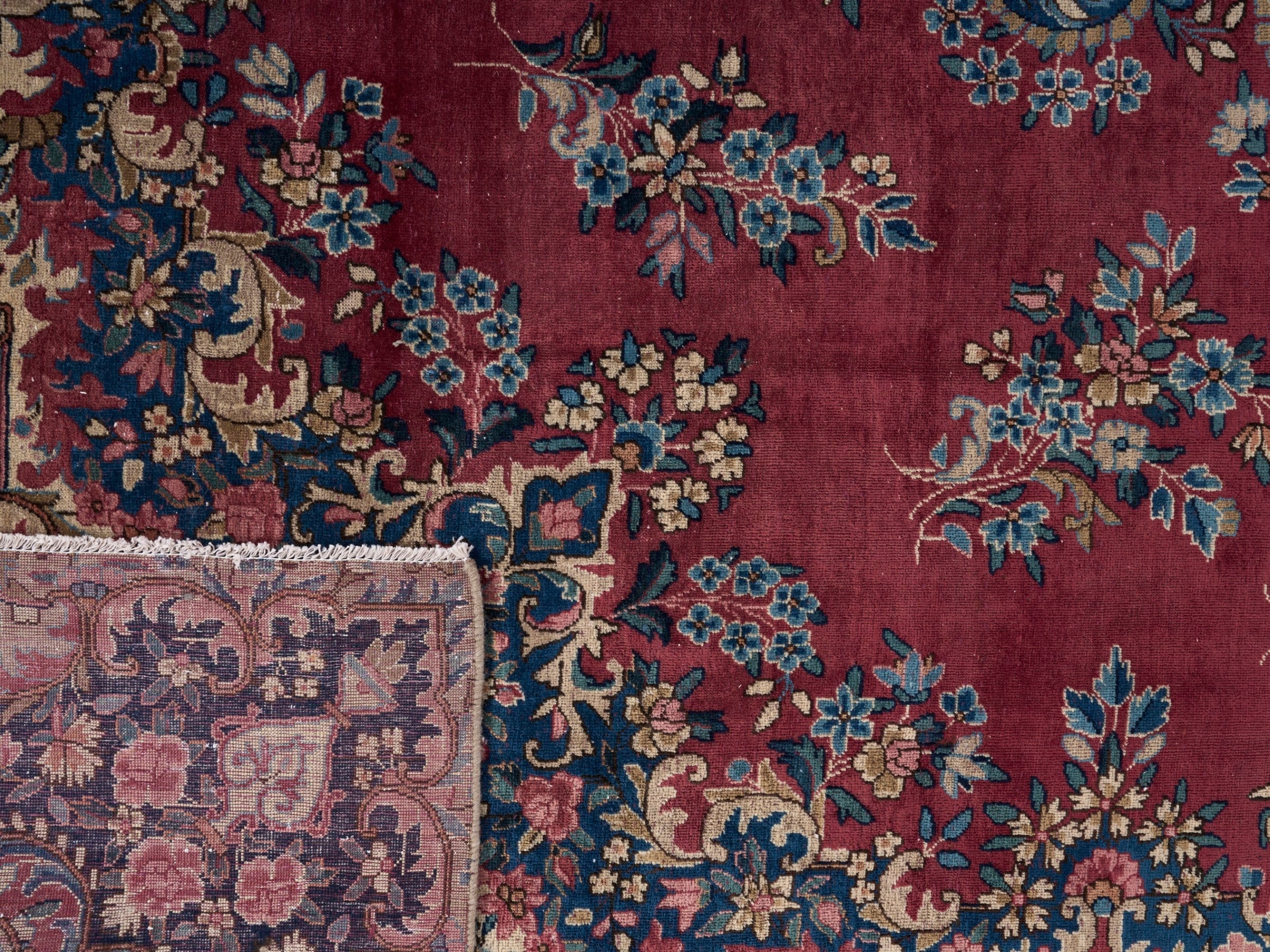 Persian Kerman oversized rug in deep red and navy, view 15 of 15