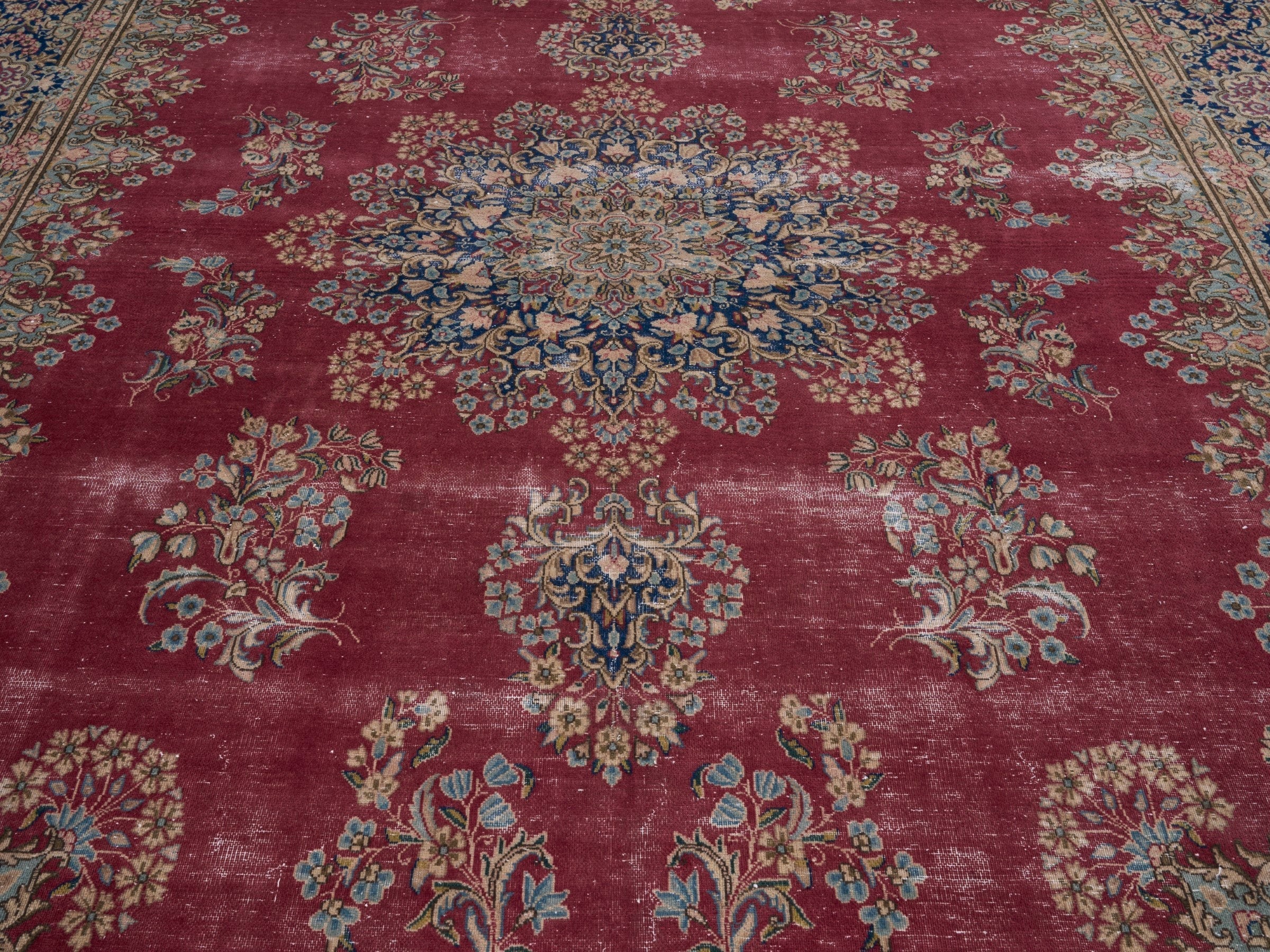 Persian Kerman oversized rug in deep red and navy, view 4 of 15