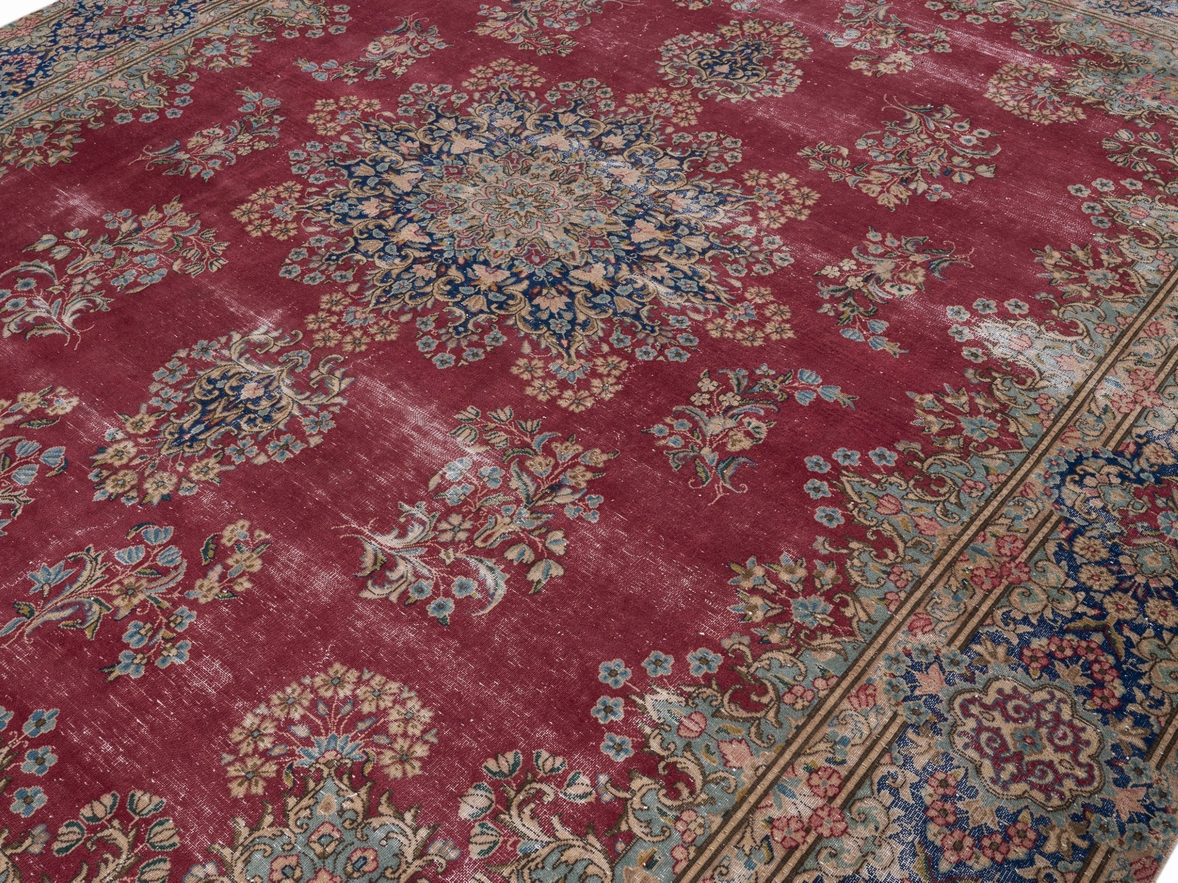 Persian Kerman oversized rug in deep red and navy, view 5 of 15