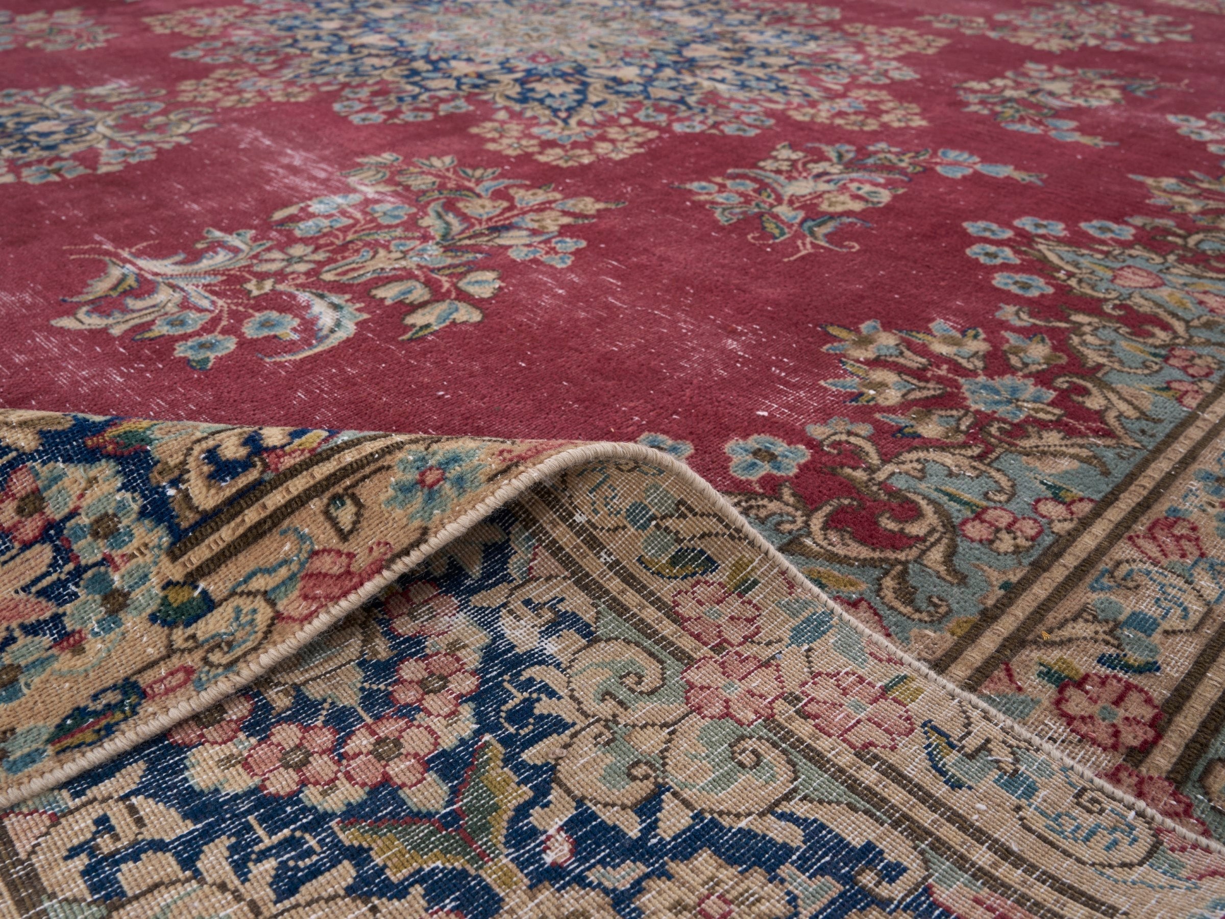 Persian Kerman oversized rug in deep red and navy, view 14 of 15
