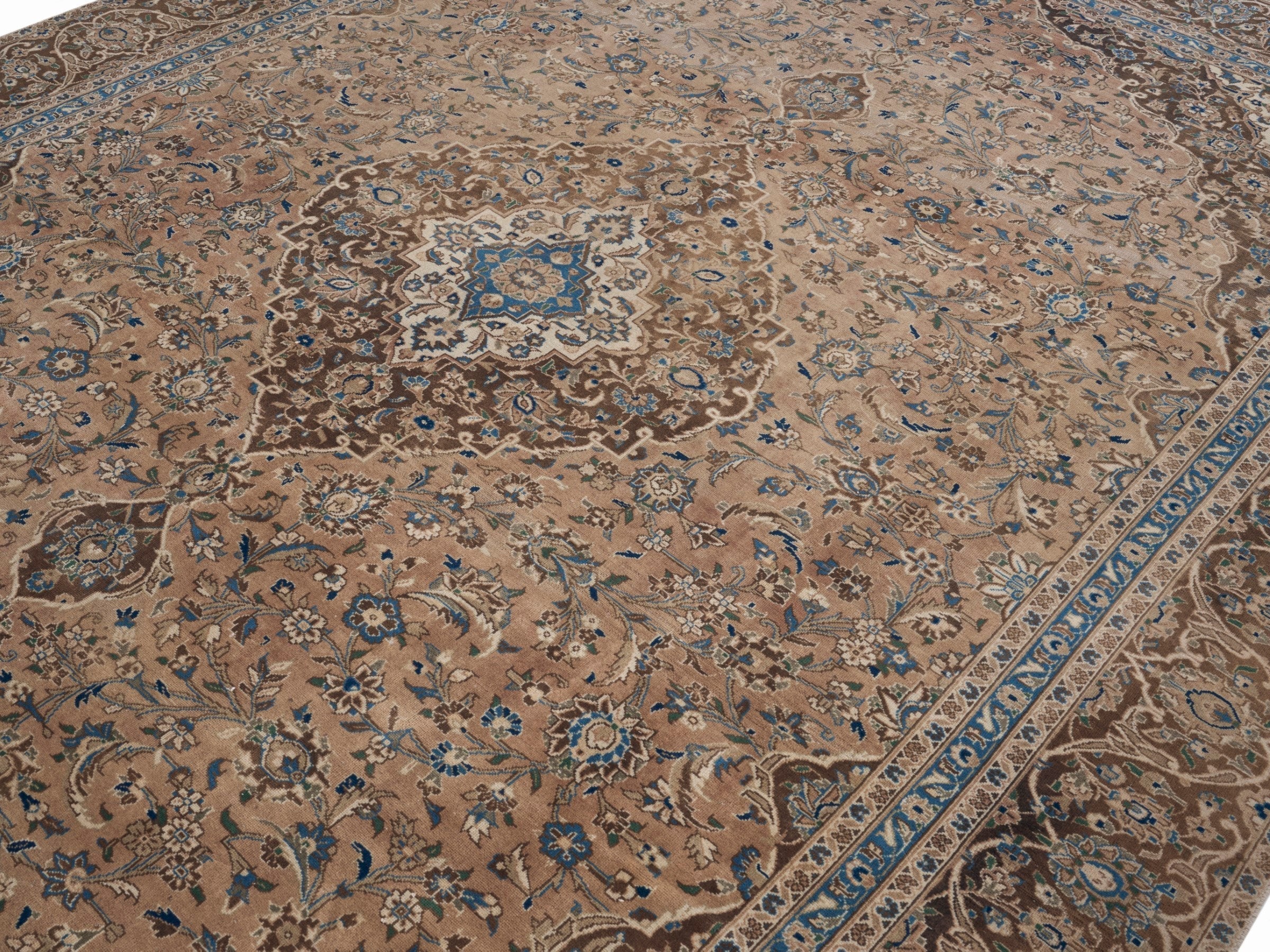 Persian Kashan oversized rug in tan and brown, view 5 of 15