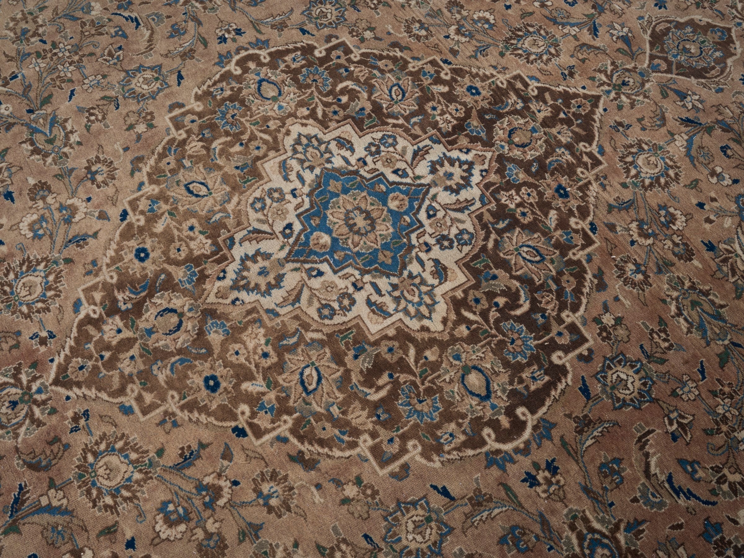 Persian Kashan oversized rug in tan and brown, view 12 of 15