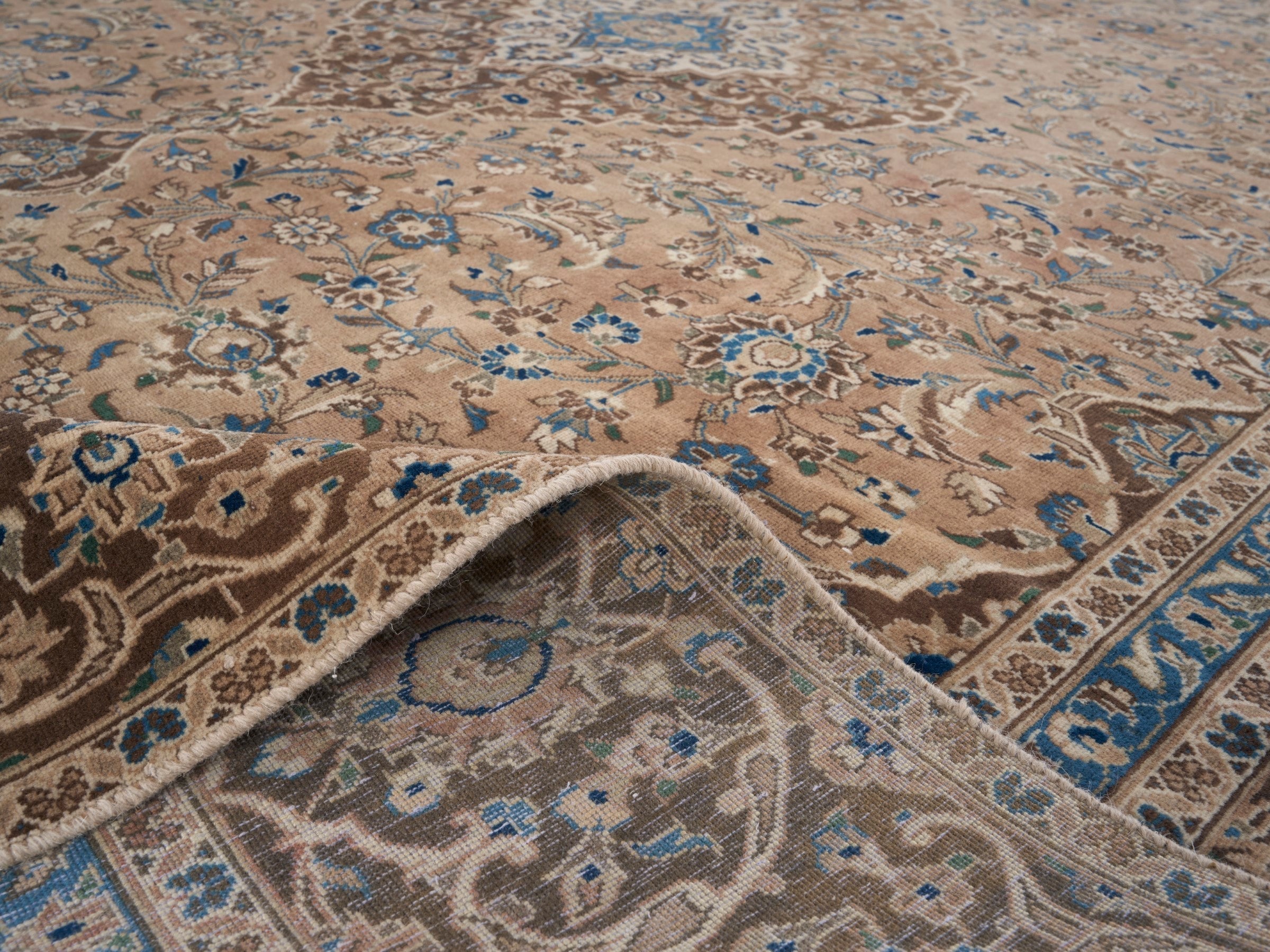 Persian Kashan oversized rug in tan and brown, view 14 of 15